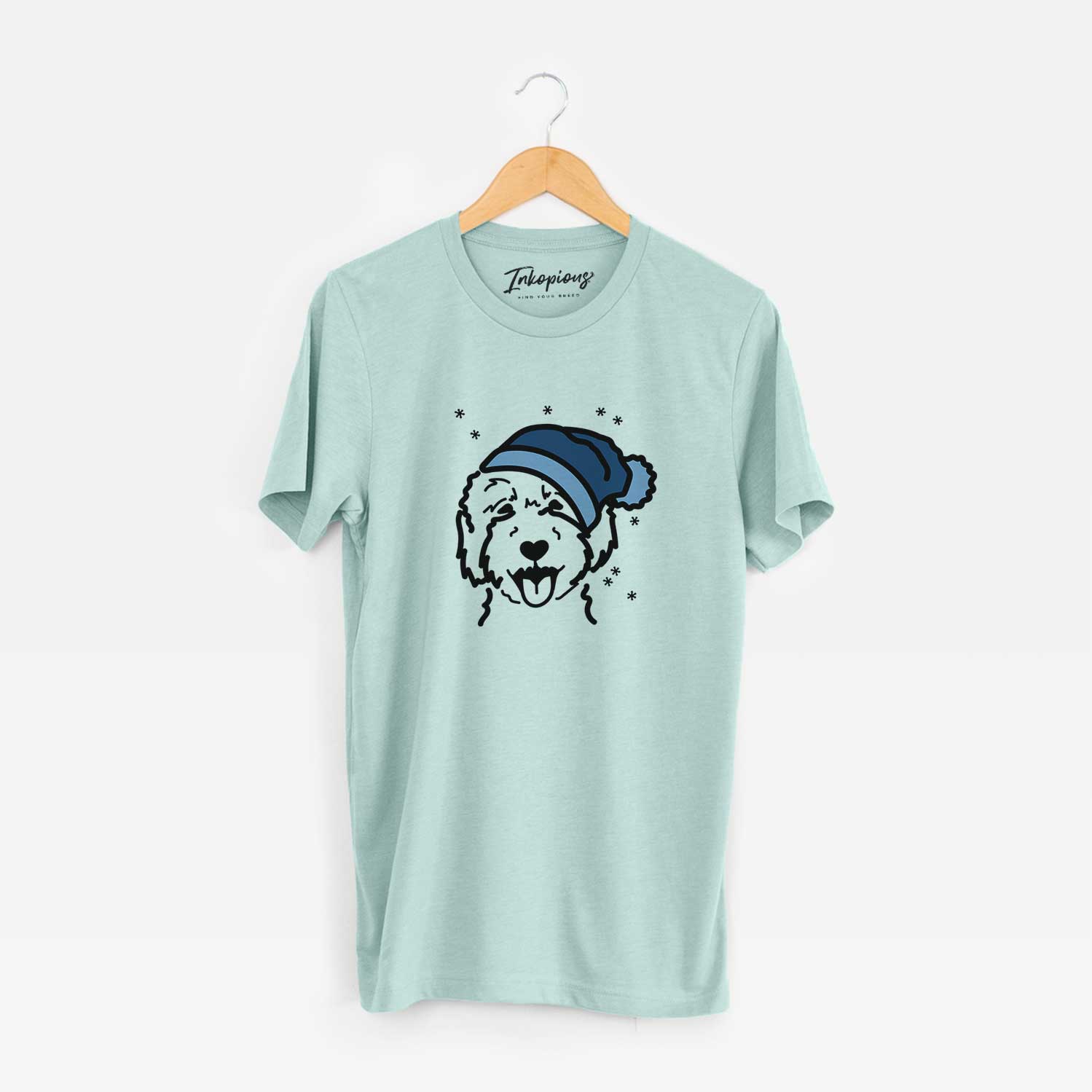 Minimalist line drawing of a Goldendoodle 2 wearing a winter beanie on a Heather Sage Unisex crewneck