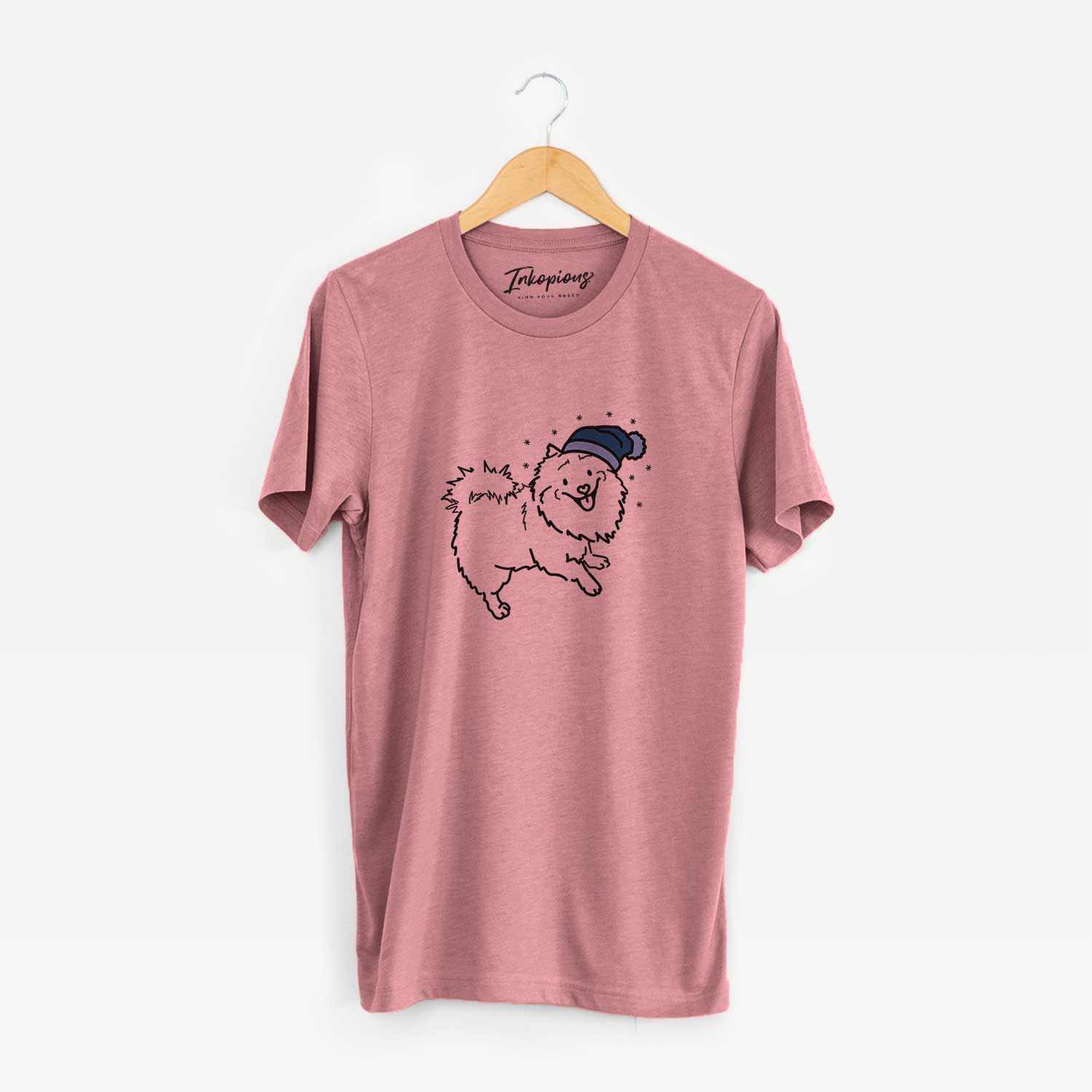Minimalist line drawing of Goldie the Pomeranian Mix wearing a winter beanie on a Mauve Unisex crewneck