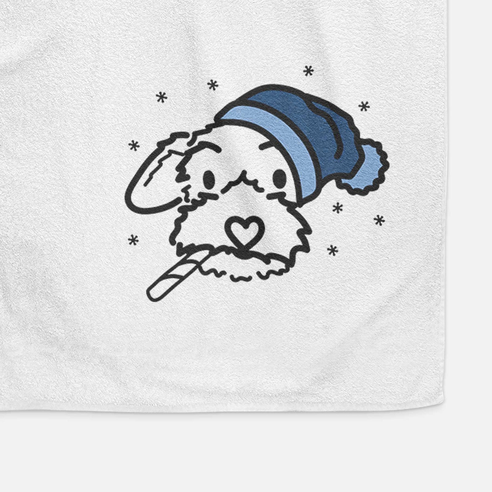 Minimalist line drawing of Gomer the Poodle Mix wearing a winter beanie on a decorative hand towel