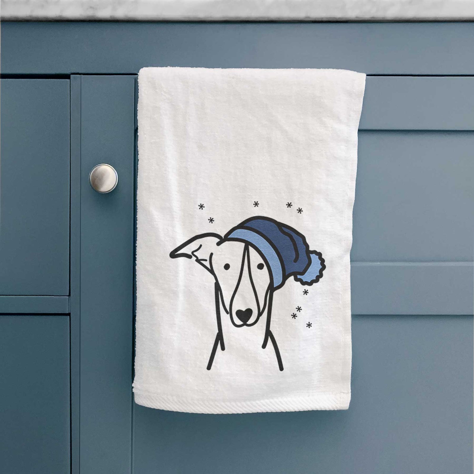 Minimalist line drawing of a Greyhound wearing a winter beanie on a decorative hand towel