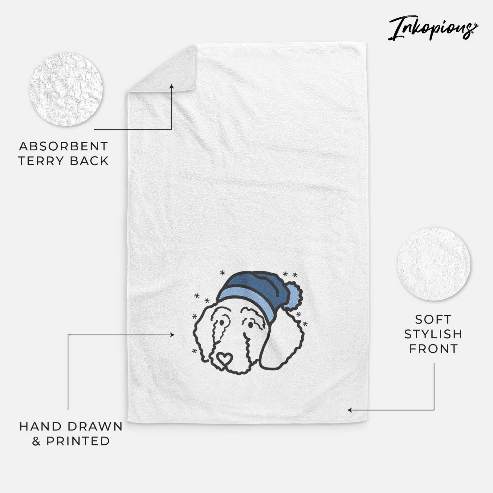Minimalist line drawing of Hanna the Goldendoodle wearing a winter beanie on a decorative hand towel
