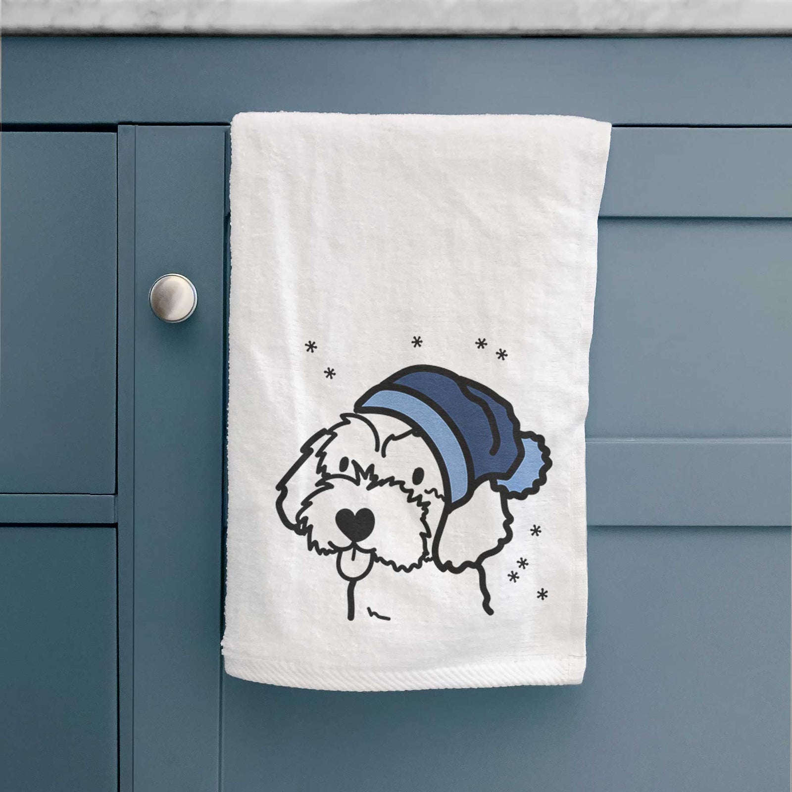 Minimalist line drawing of a Havapoo wearing a winter beanie on a decorative hand towel