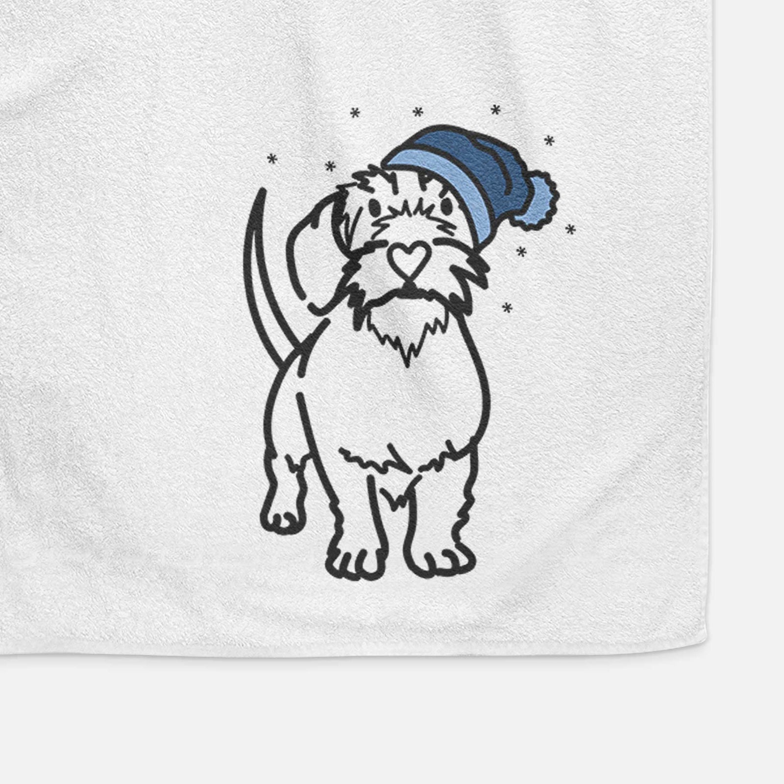 Minimalist line drawing of Henry the Wire Dachshund wearing a winter beanie on a decorative hand towel