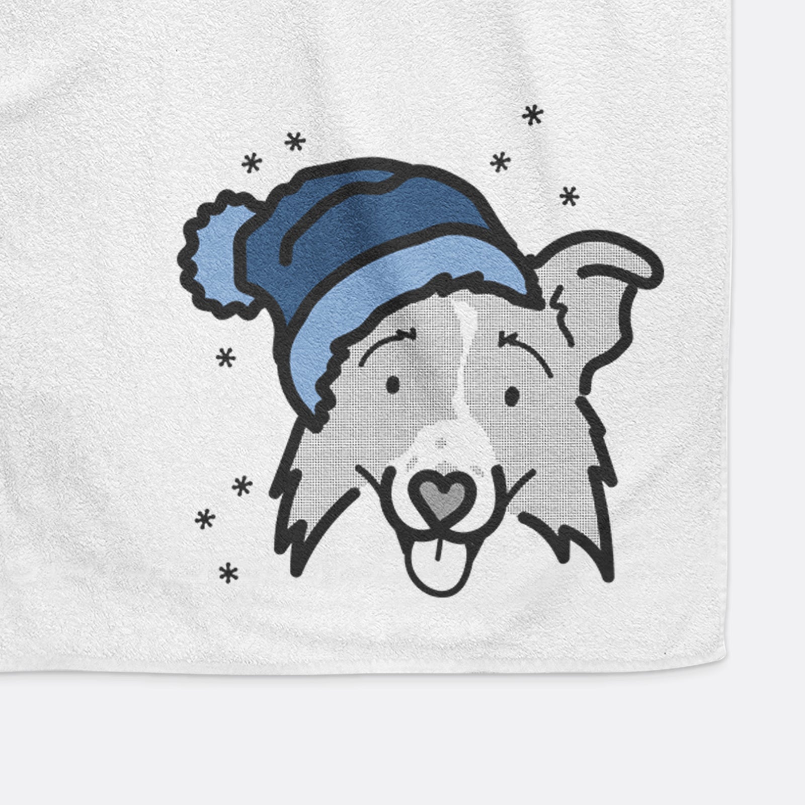 Minimalist line drawing of Jam the Border Collie 2.0 wearing a winter beanie on a decorative hand towel