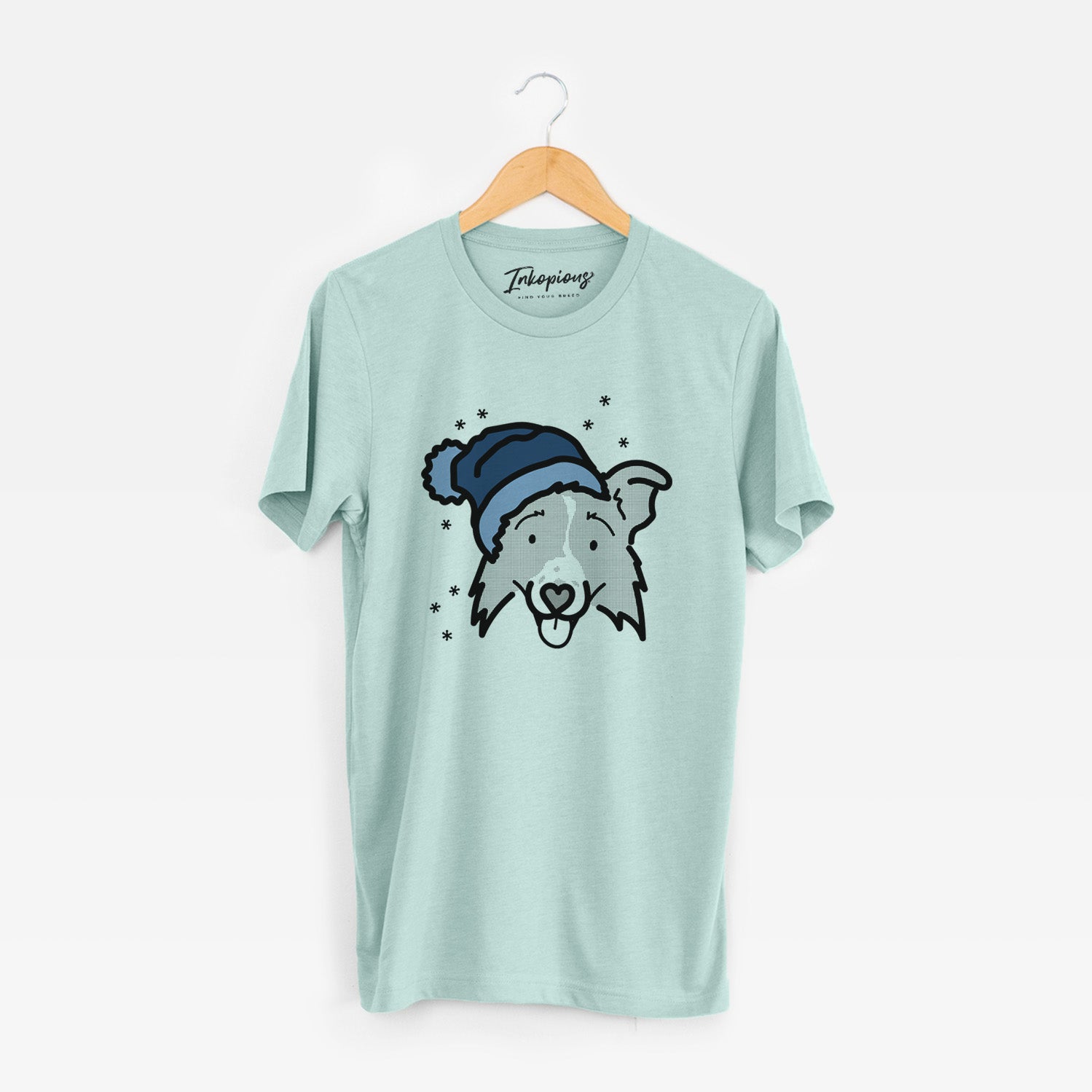 Minimalist line drawing of Jam the Border Collie 2.0 wearing a winter beanie on a Heather Sage Unisex crewneck