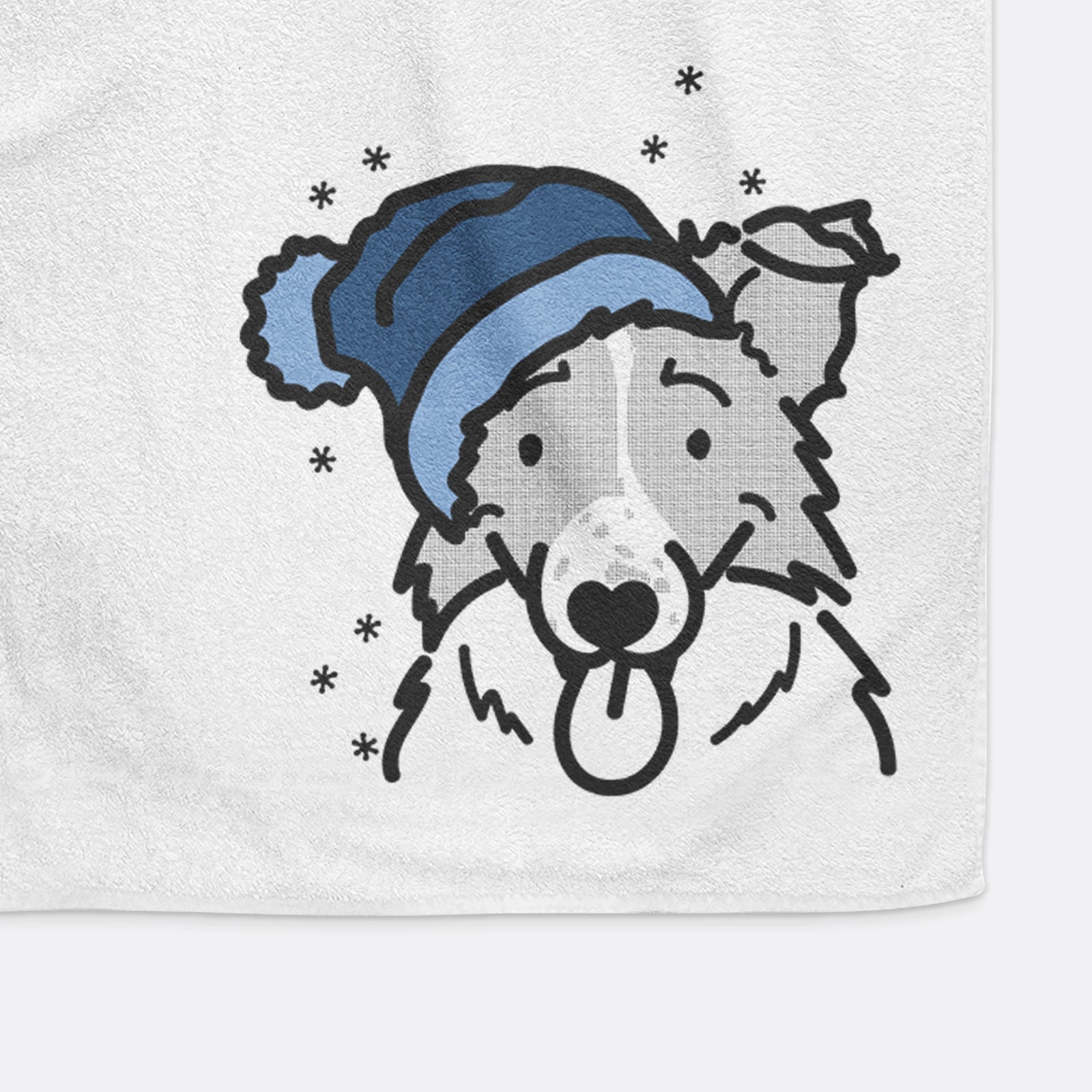 Minimalist line drawing of Jam the Border Collie wearing a winter beanie on a decorative hand towel