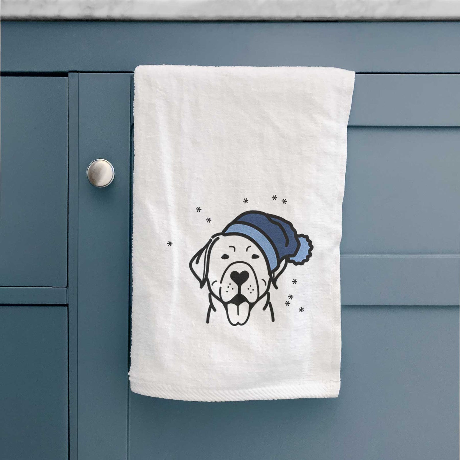 Minimalist line drawing of a Labrador Retriever wearing a winter beanie on a decorative hand towel