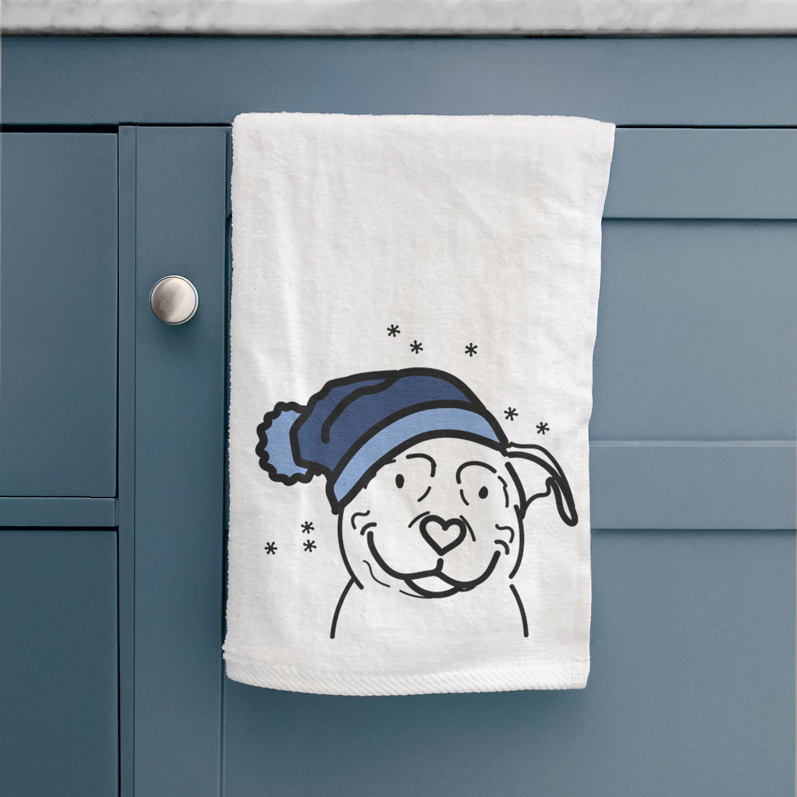 Minimalist line drawing of Lady the American Pitbull Terrier wearing a winter beanie on a decorative hand towel