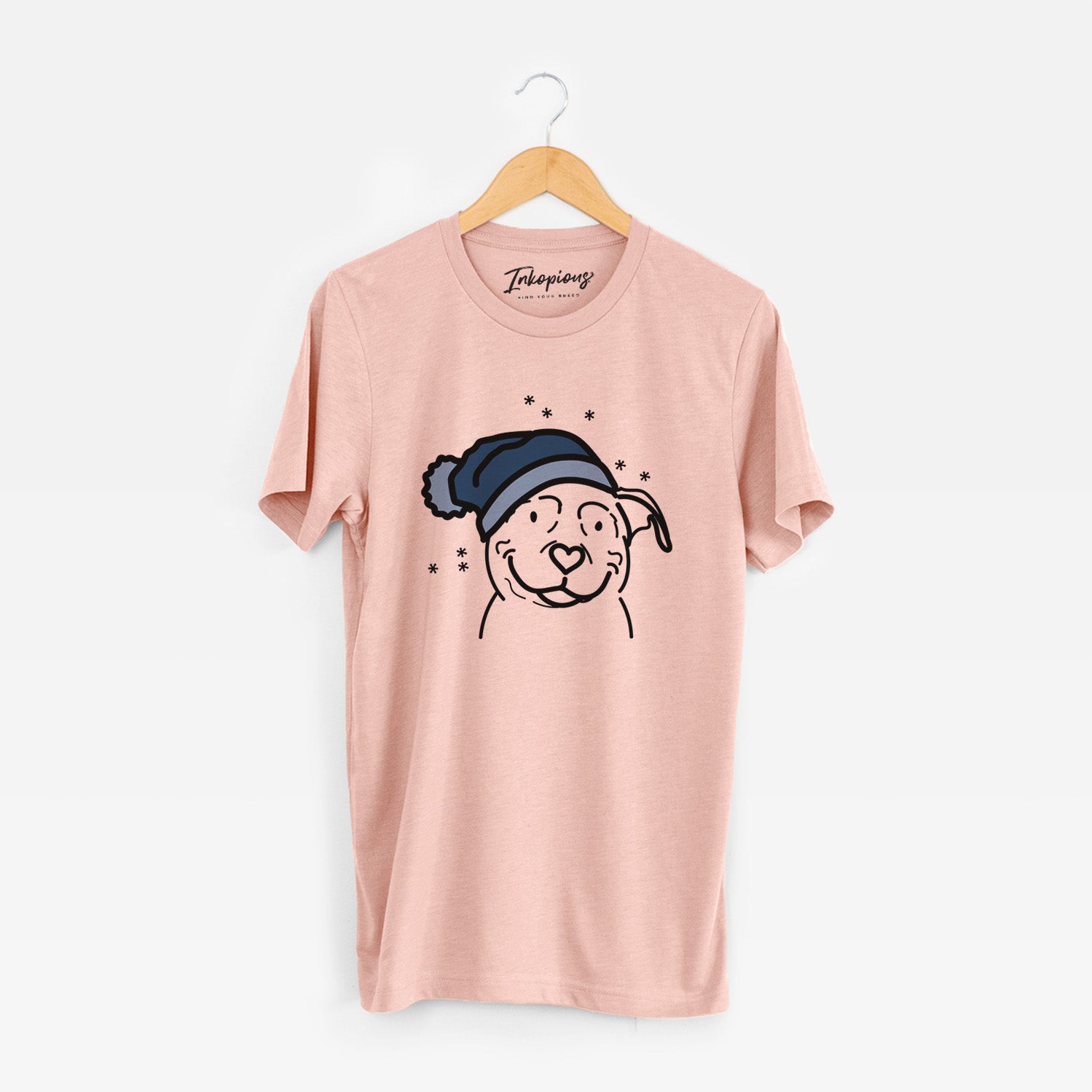 Minimalist line drawing of Lady the American Pitbull Terrier wearing a winter beanie on a Peach Unisex crewneck