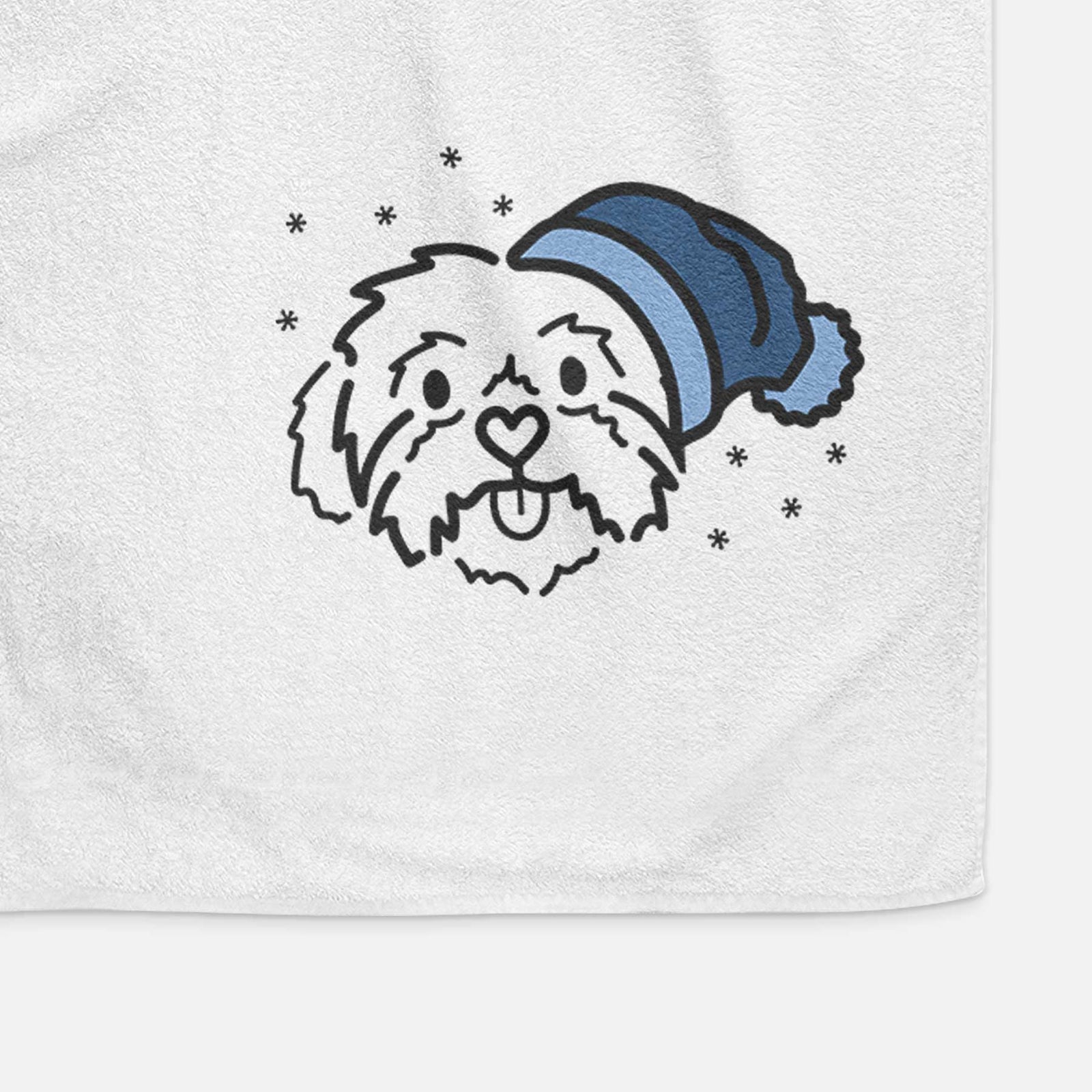 Minimalist line drawing of Leo the Shih Tzu wearing a winter beanie on a decorative hand towel