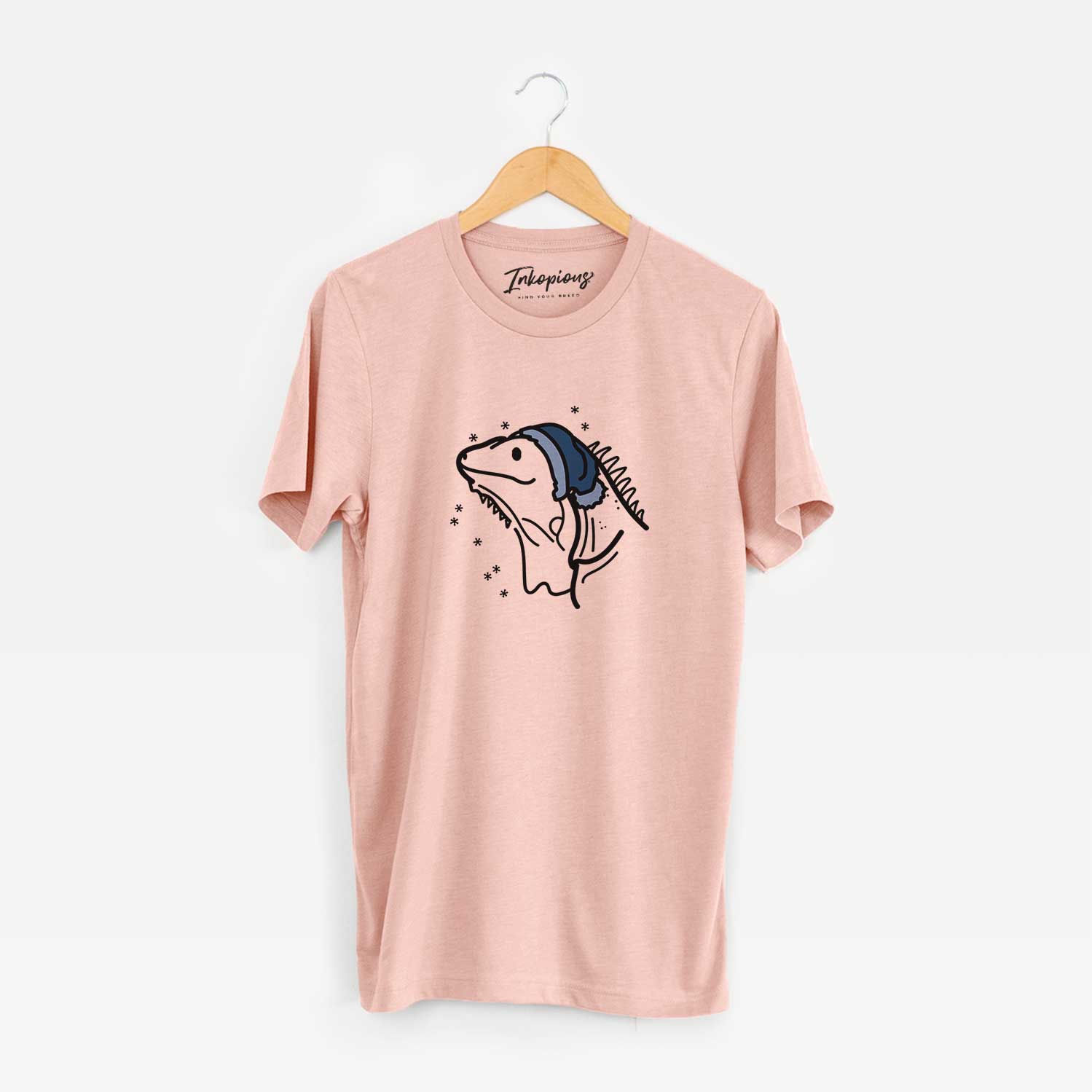 Minimalist line drawing of Louie the Iguana wearing a winter beanie on a Peach Unisex crewneck