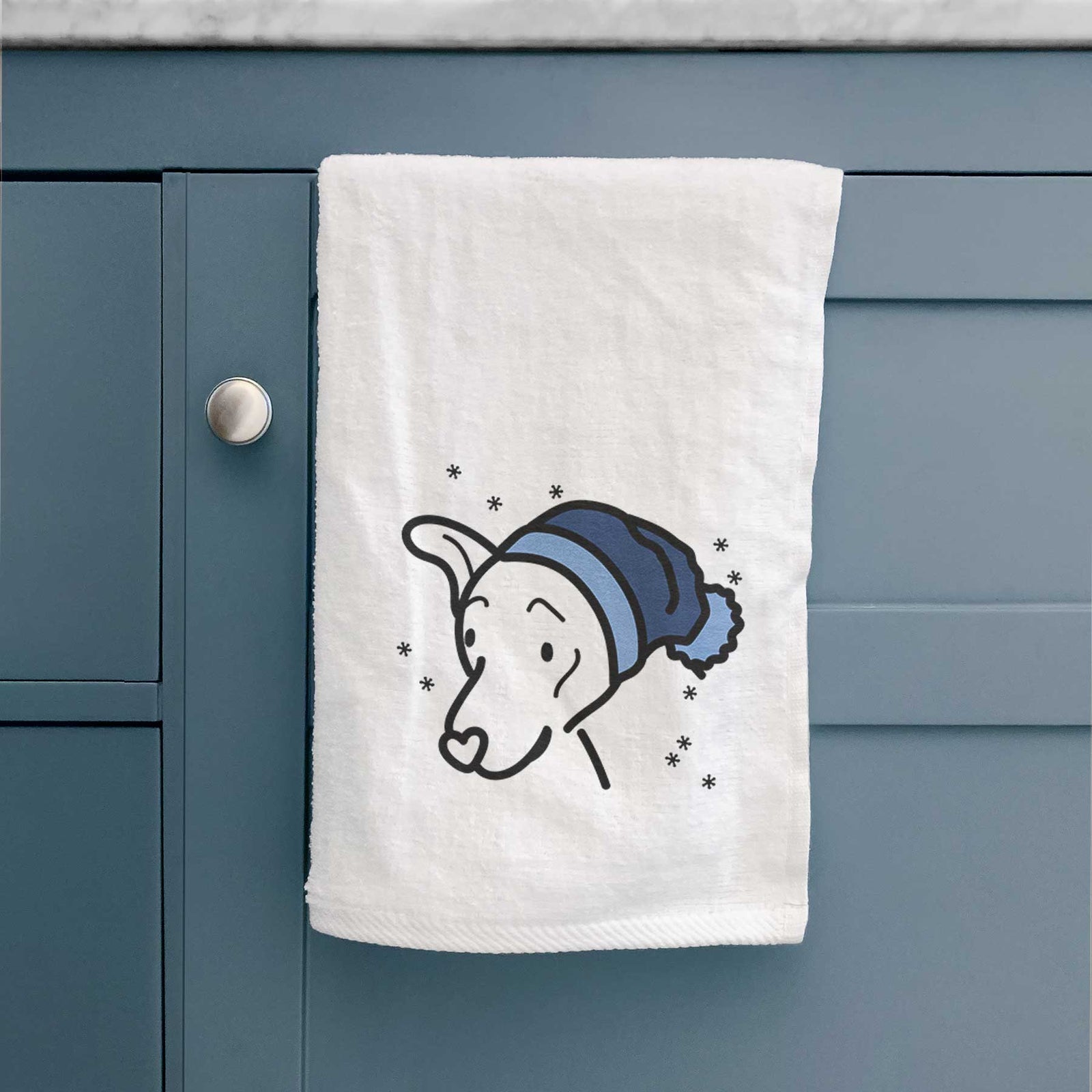Minimalist line drawing of Lucky the Mixed Breed wearing a winter beanie on a decorative hand towel