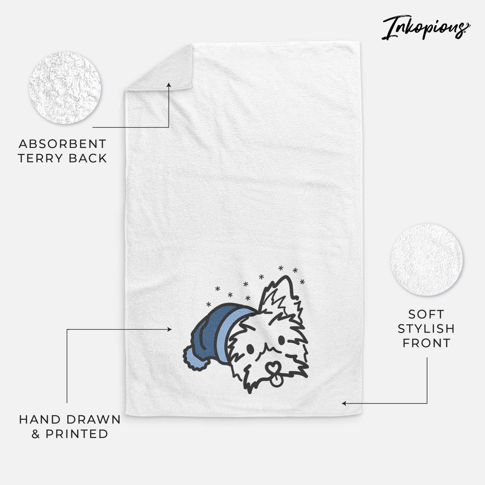 Minimalist line drawing of Luna the Yorkshire Terrier wearing a winter beanie on a decorative hand towel
