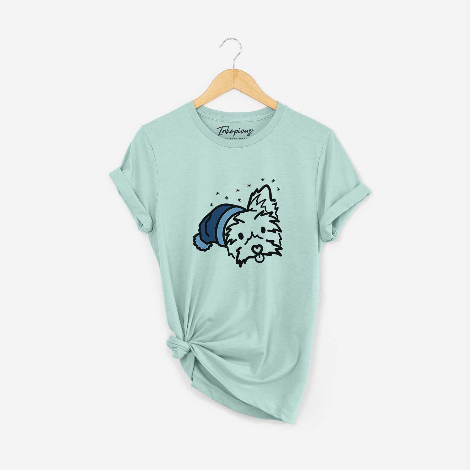 Minimalist line drawing of Luna the Yorkshire Terrier wearing a winter beanie on a Heather Sage Unisex crewneck