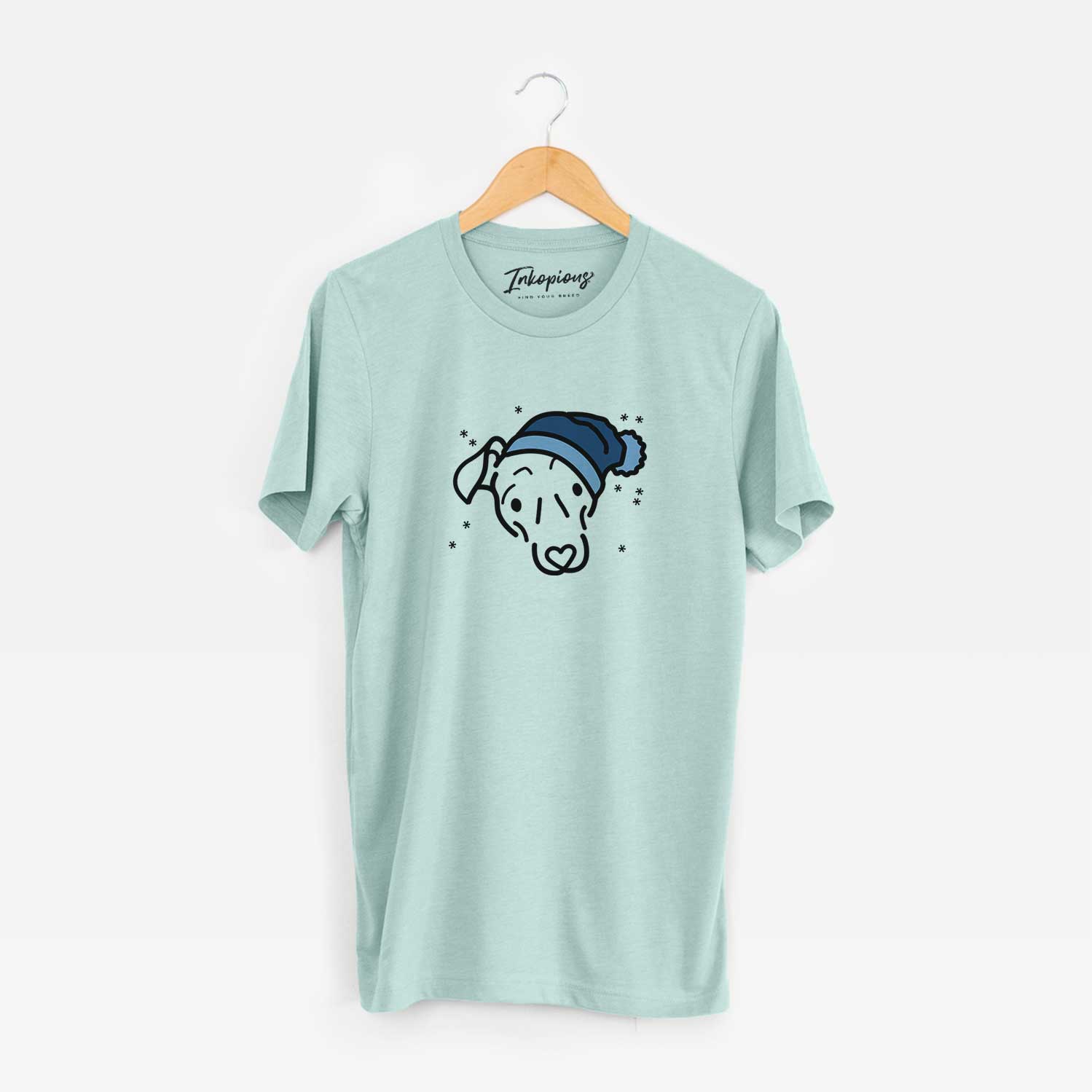 Minimalist line drawing of Millie the Mixed Breed wearing a winter beanie on a Heather Sage Unisex crewneck