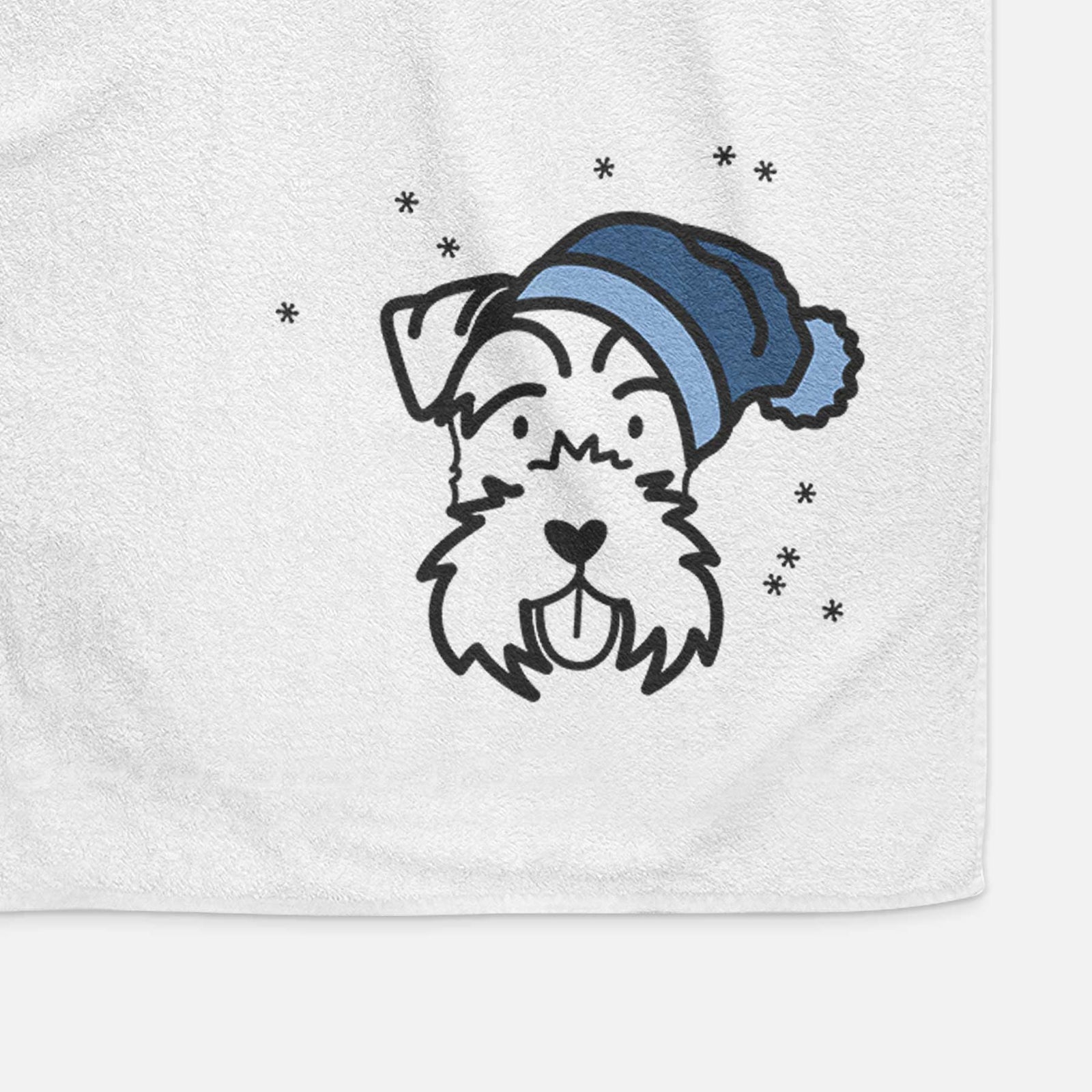 Minimalist line drawing of a Miniature Schnauzer wearing a winter beanie on a decorative hand towel