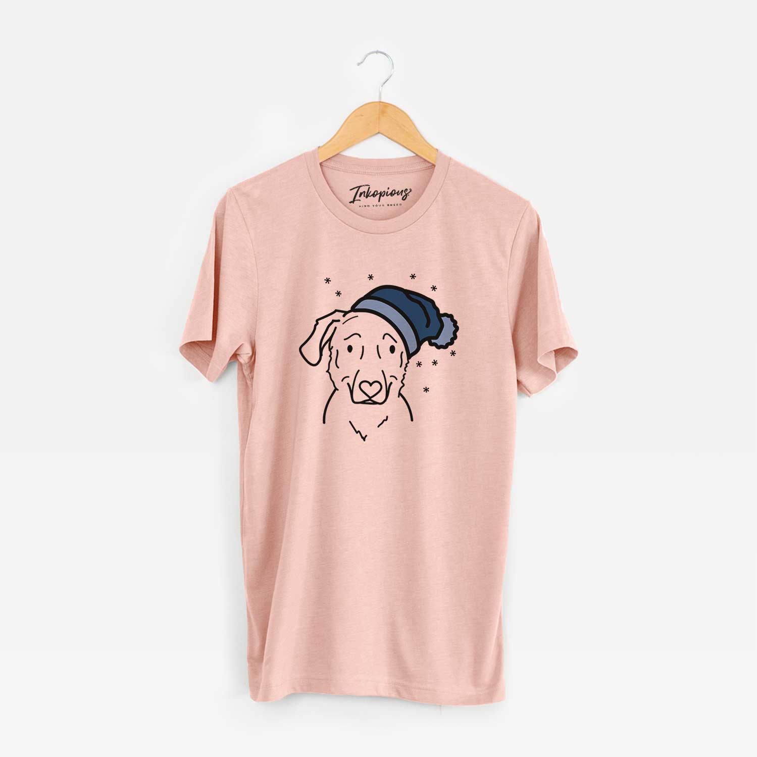Minimalist line drawing of Mitzi the Golden Retriever Mix wearing a winter beanie on a Peach Unisex crewneck