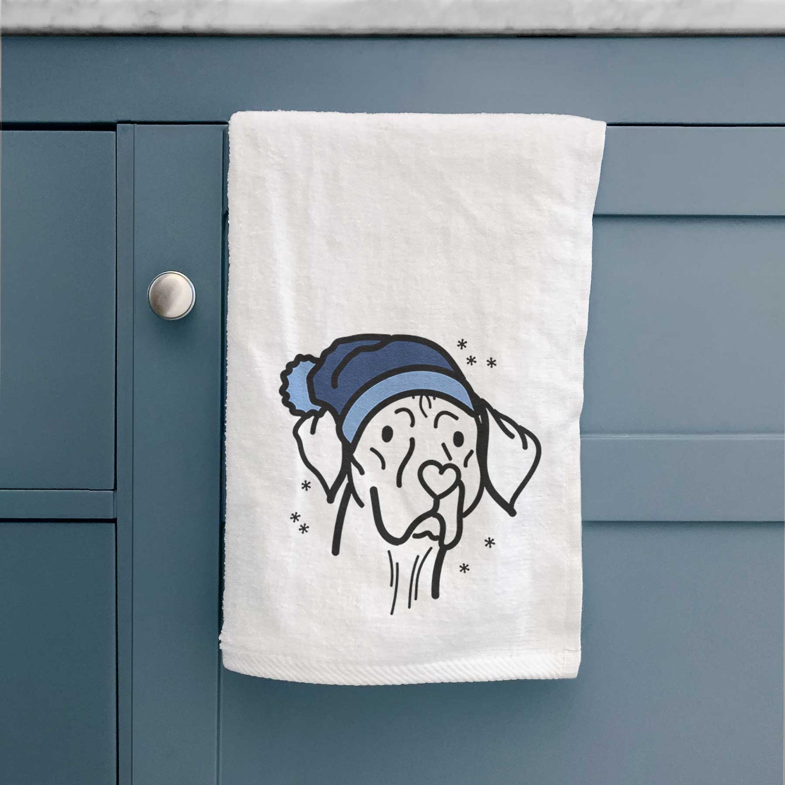 Minimalist line drawing of Moose the Vizsla wearing a winter beanie on a decorative hand towel