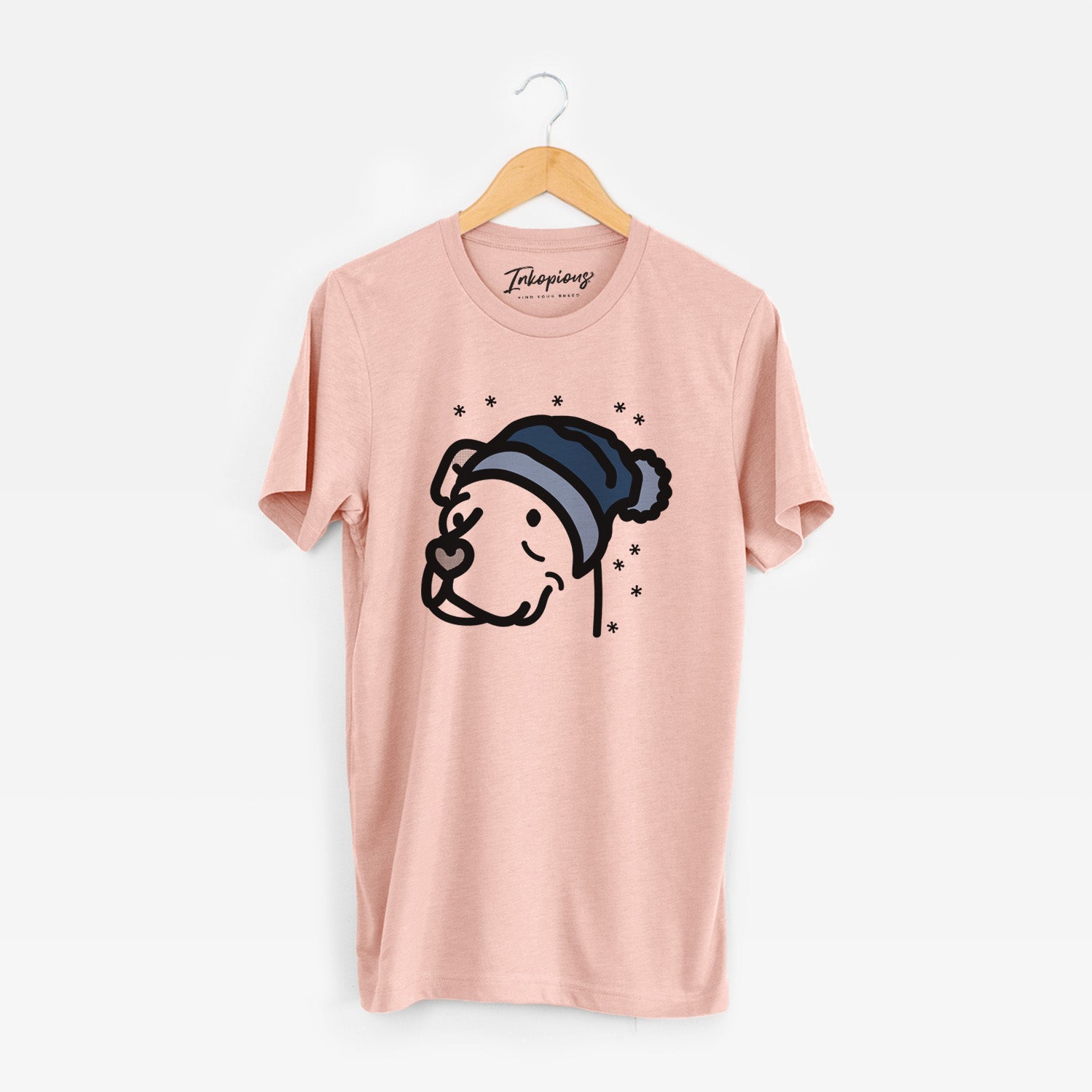 Minimalist line drawing of Mr. Sir the Pitbull Mix wearing a winter beanie on a Peach Unisex crewneck