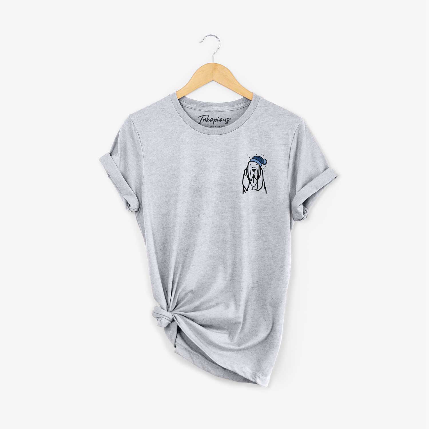 Small chest-pocket minimalist line drawing of a Bloodhound wearing a winter beanie on a Grey Unisex crewneck