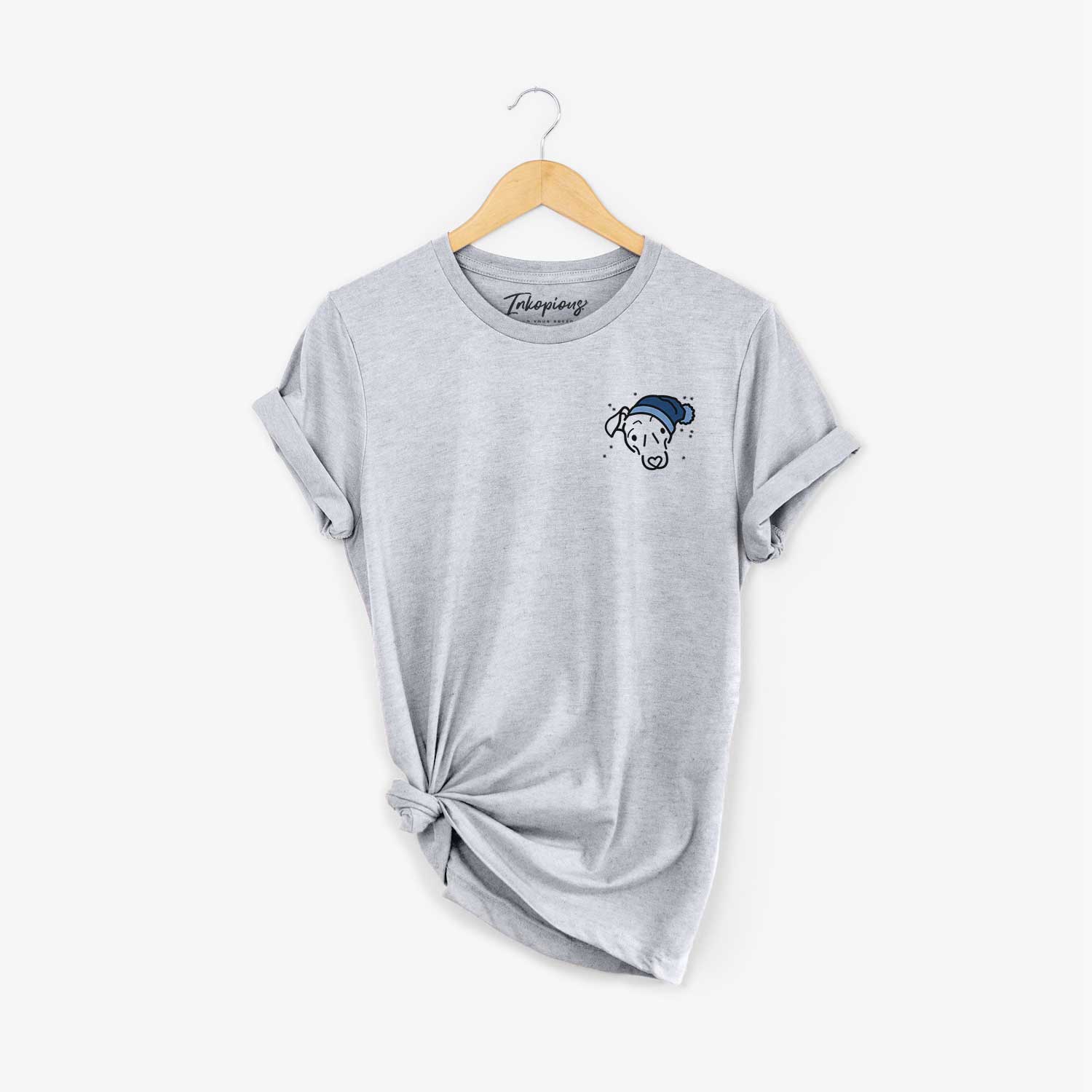 Small chest-pocket minimalist line drawing of Millie the Mixed Breed wearing a winter beanie on a Grey Unisex crewneck