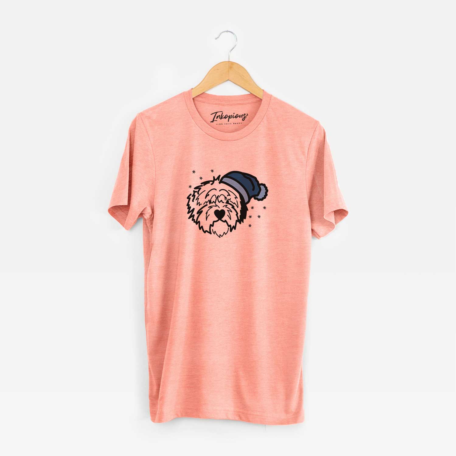 Minimalist line drawing of Penny the Old English Sheepdog wearing a winter beanie on a Sunset Unisex crewneck