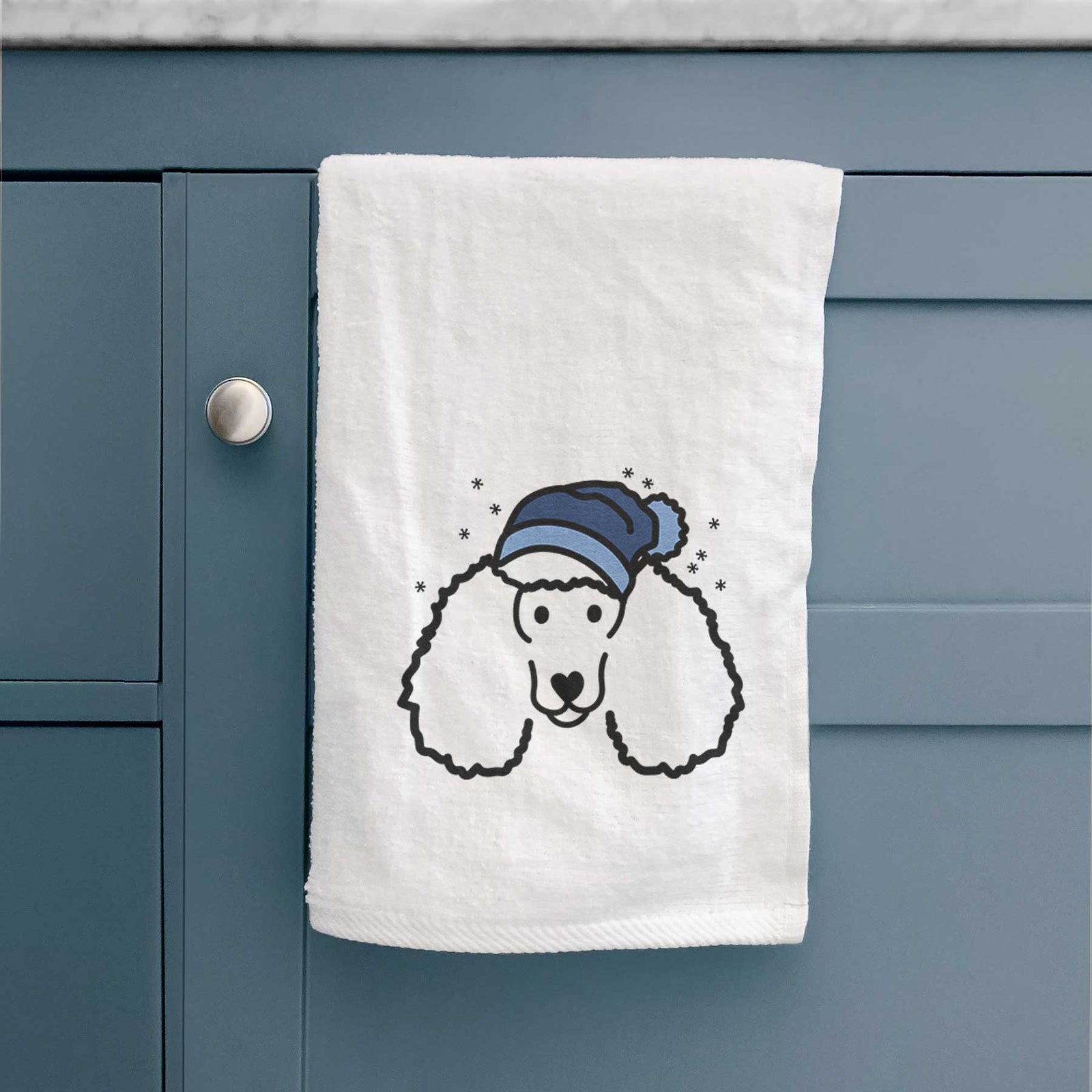 Minimalist line drawing of a Poodle wearing a winter beanie on a decorative hand towel