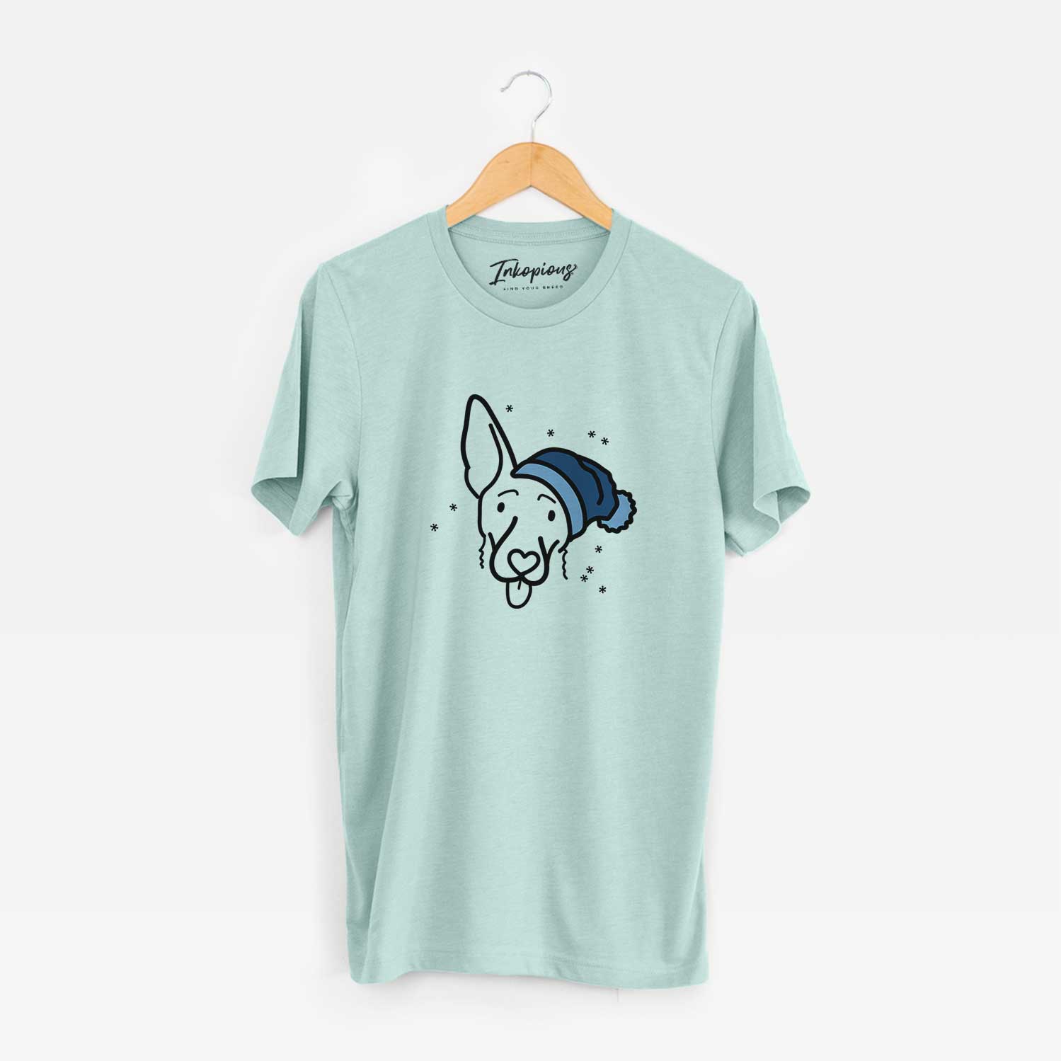 Minimalist line drawing of Rosie the Shepherd Mix wearing a winter beanie on a Heather Sage Unisex crewneck