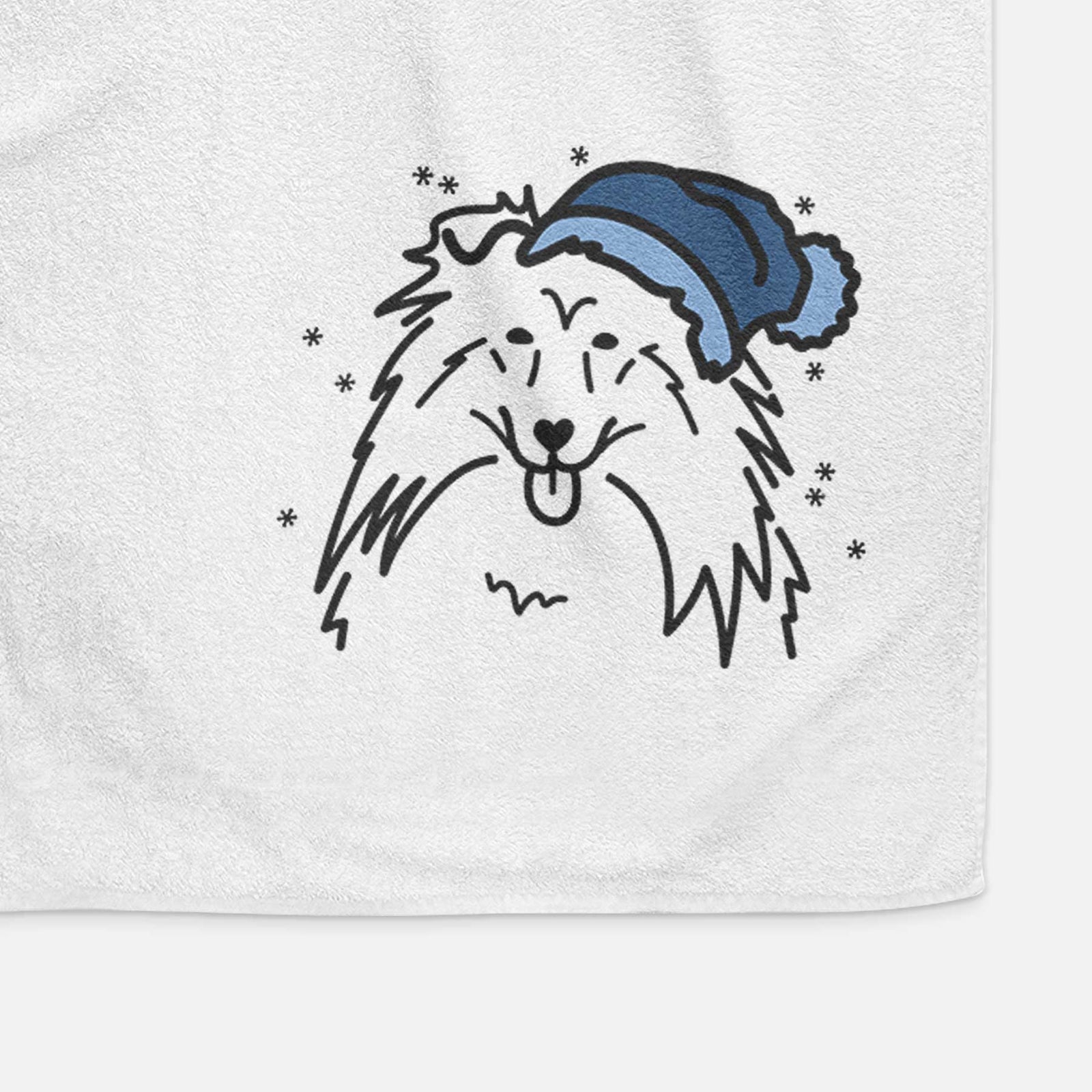Minimalist line drawing of a Rough Collie wearing a winter beanie on a decorative hand towel