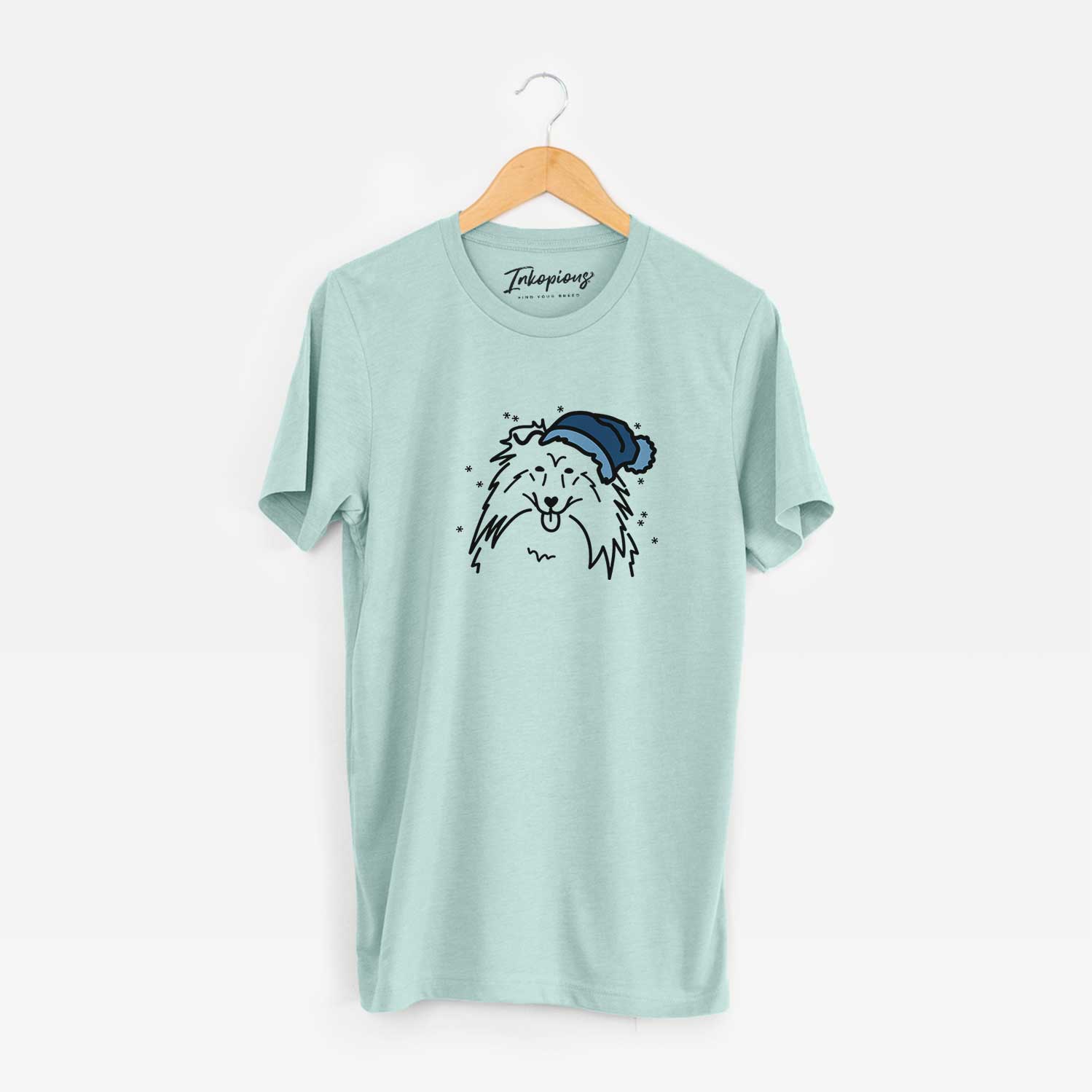 Minimalist line drawing of a Rough Collie wearing a winter beanie on a Heather Sage Unisex crewneck