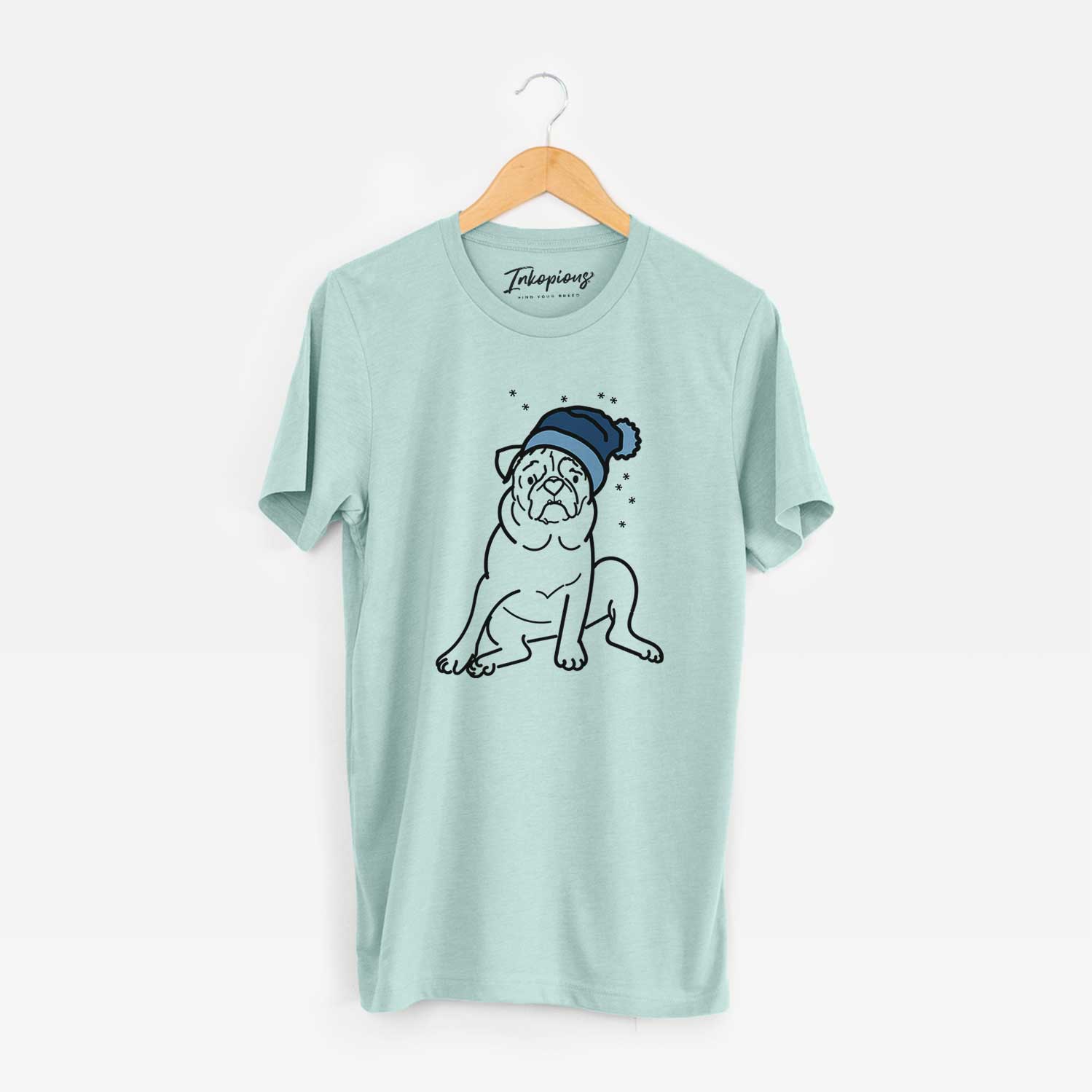 Minimalist line drawing of Rudy the Pug wearing a winter beanie on a Heather Sage Unisex crewneck