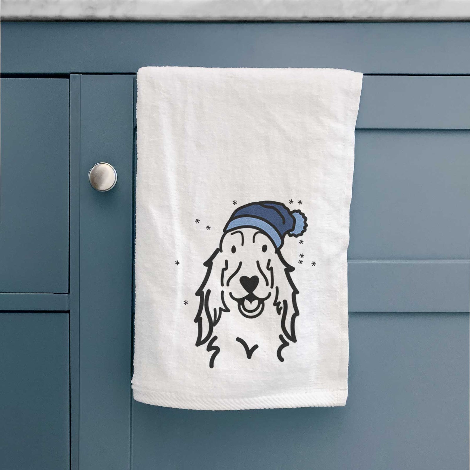 Minimalist line drawing of a Setter wearing a winter beanie on a decorative hand towel