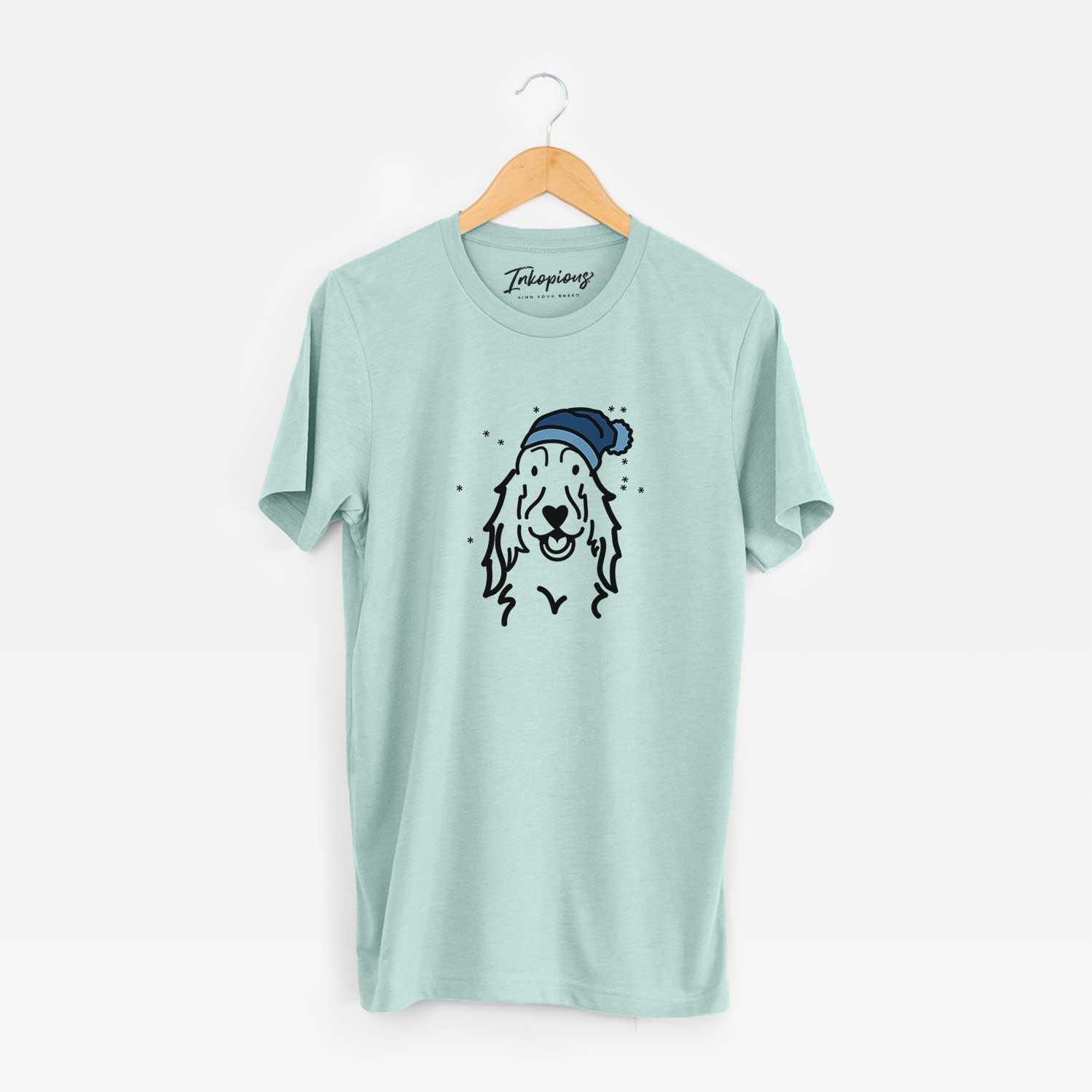 Minimalist line drawing of a Setter wearing a winter beanie on a Heather Sage Unisex crewneck