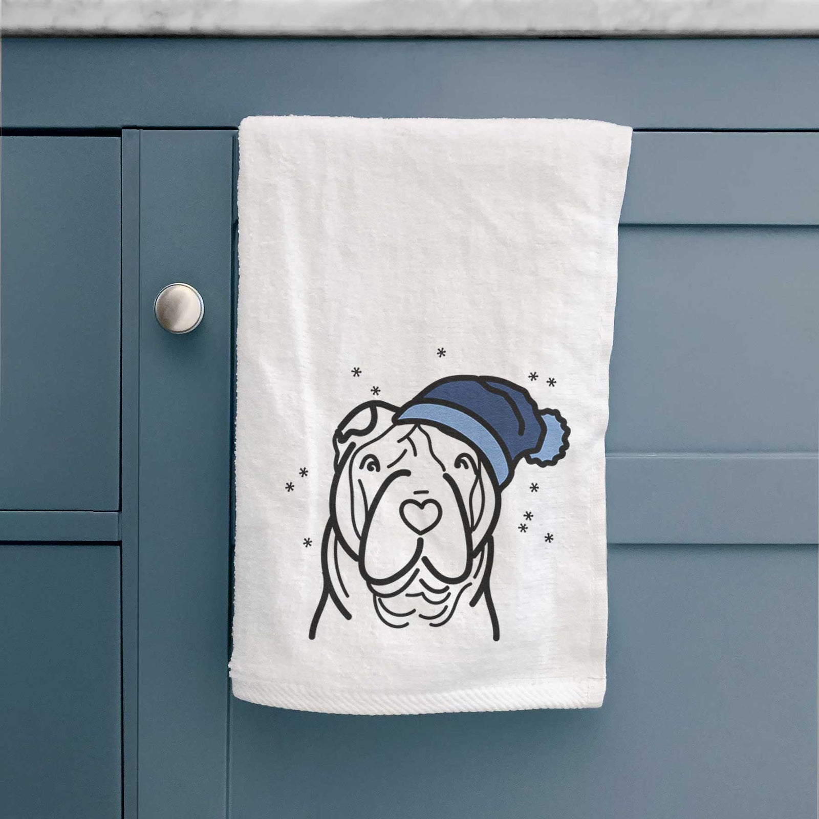 Minimalist line drawing of a Shar Pei wearing a winter beanie on a decorative hand towel