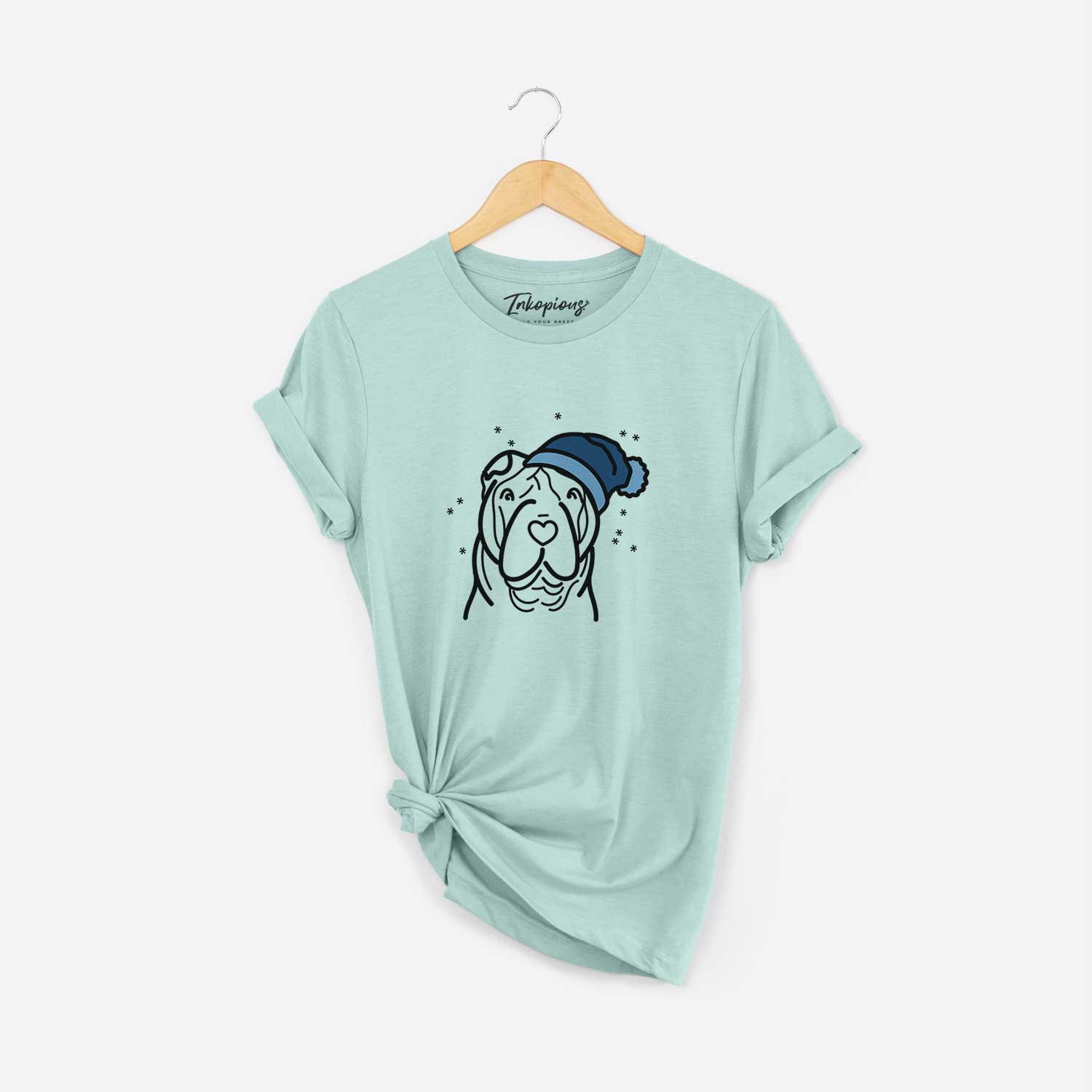 Minimalist line drawing of a Shar Pei wearing a winter beanie on a Heather Sage Unisex crewneck