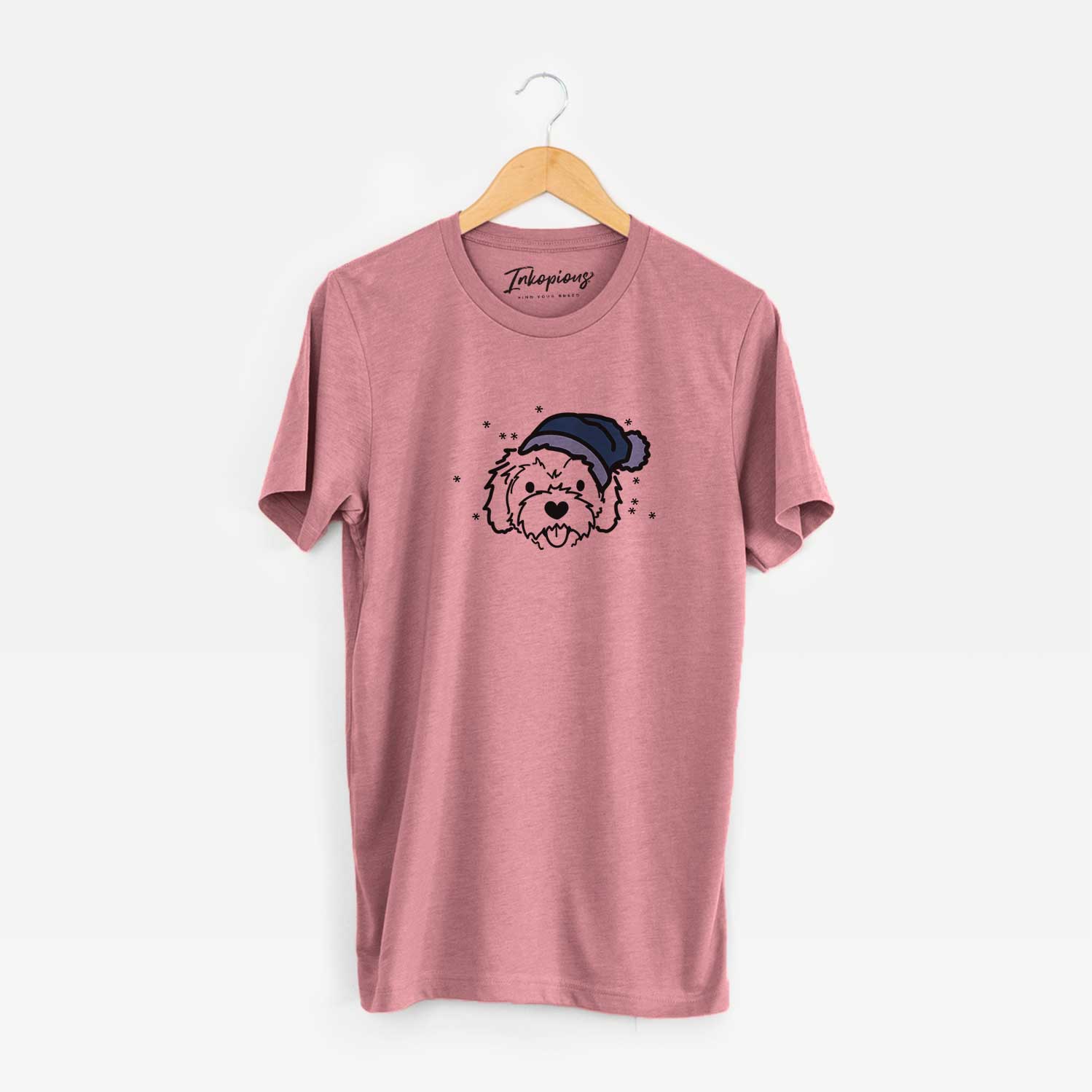 Minimalist line drawing of Sprinkles the Cockapoo wearing a winter beanie on a Mauve Unisex crewneck
