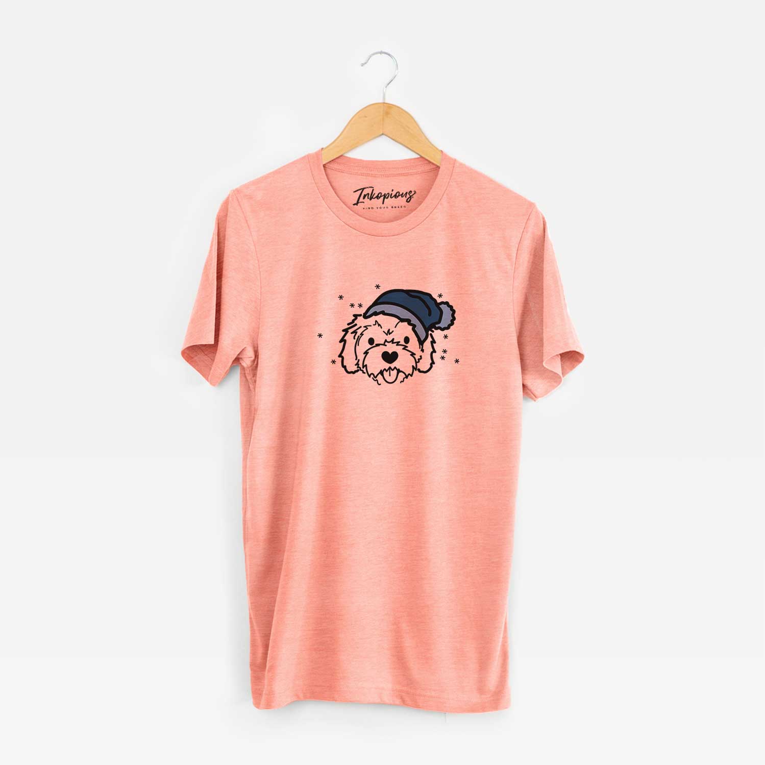 Minimalist line drawing of Sprinkles the Cockapoo wearing a winter beanie on a Sunset Unisex crewneck