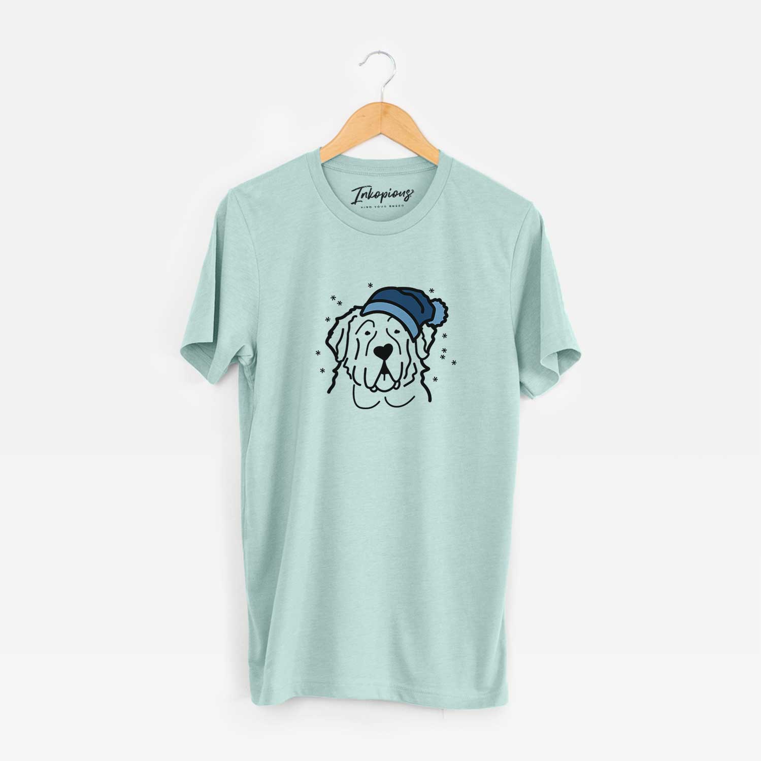 Minimalist line drawing of a Saint Bernard wearing a winter beanie on a Heather Sage Unisex crewneck