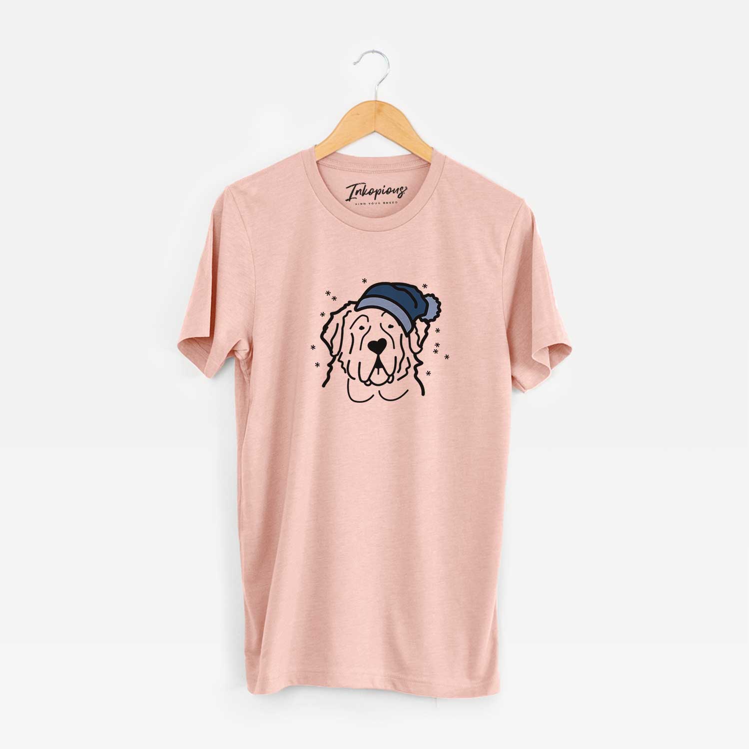 Minimalist line drawing of a Saint Bernard wearing a winter beanie on a Peach Unisex crewneck