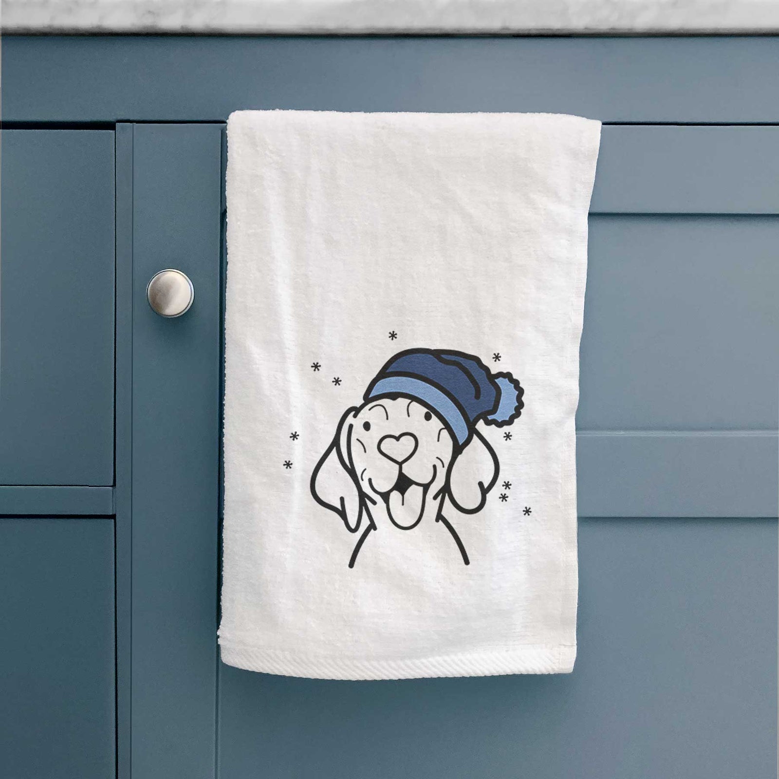 Minimalist line drawing of a Vizsla wearing a winter beanie on a decorative hand towel