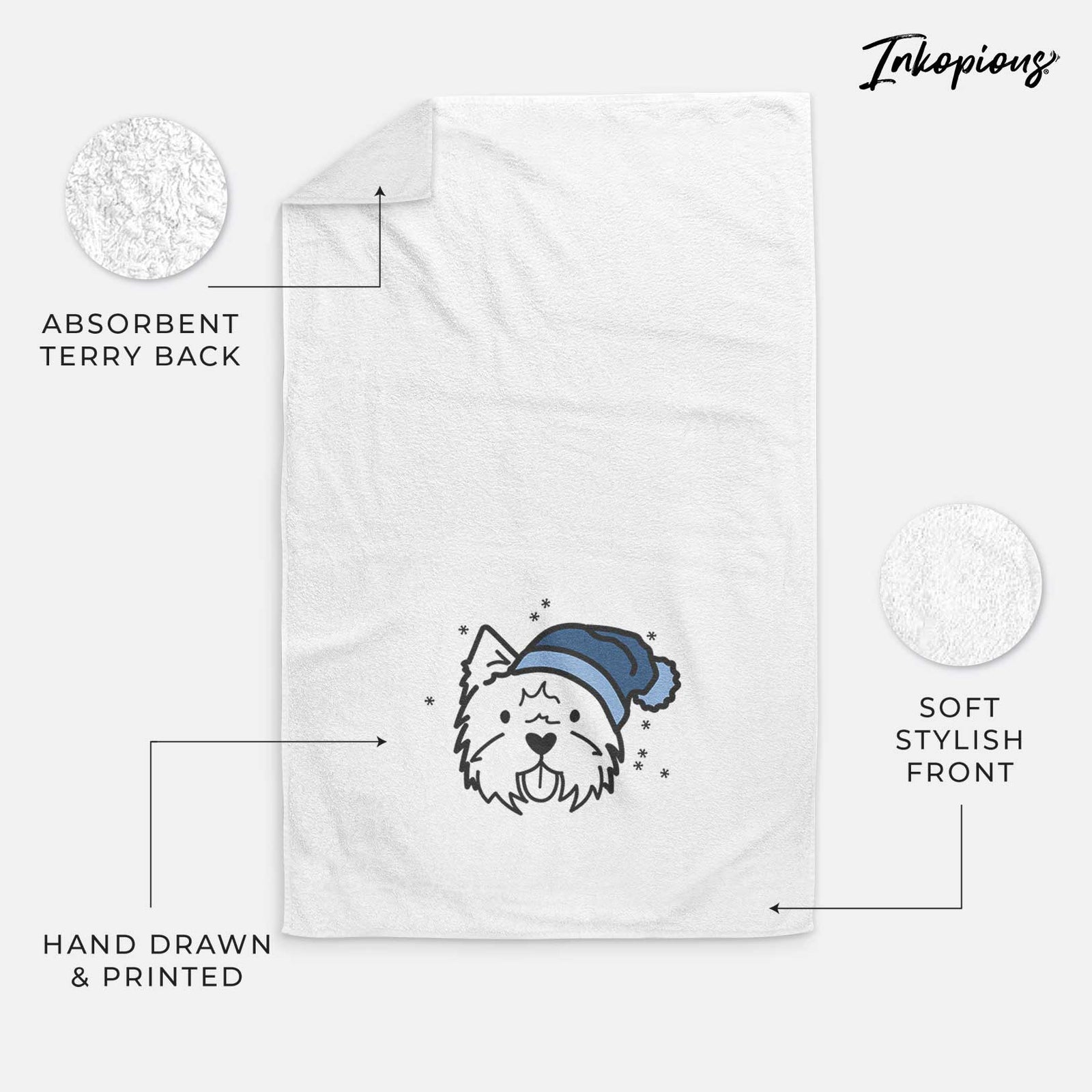 Minimalist line drawing of a West Highland Terrier wearing a winter beanie on a decorative hand towel