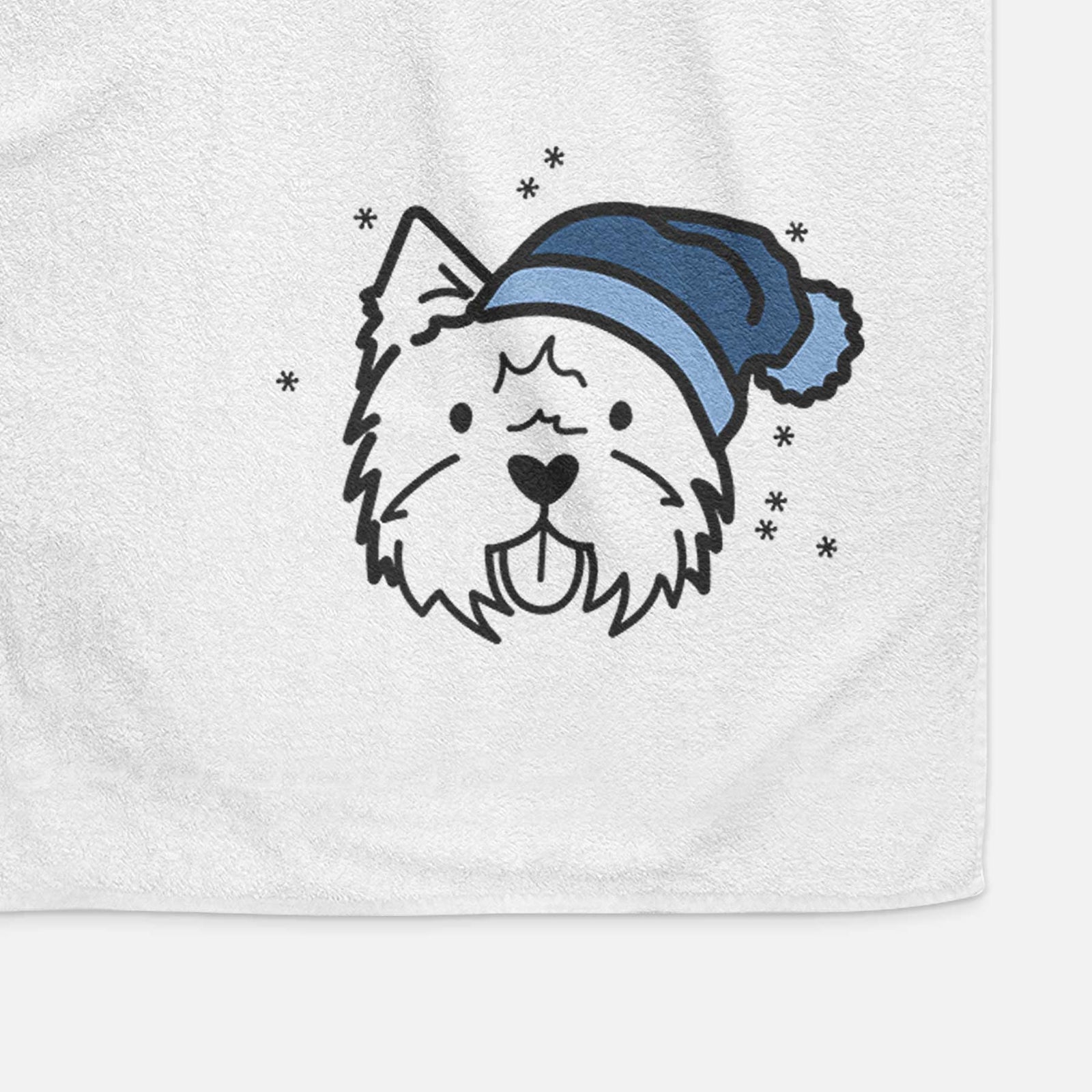 Minimalist line drawing of a West Highland Terrier wearing a winter beanie on a decorative hand towel