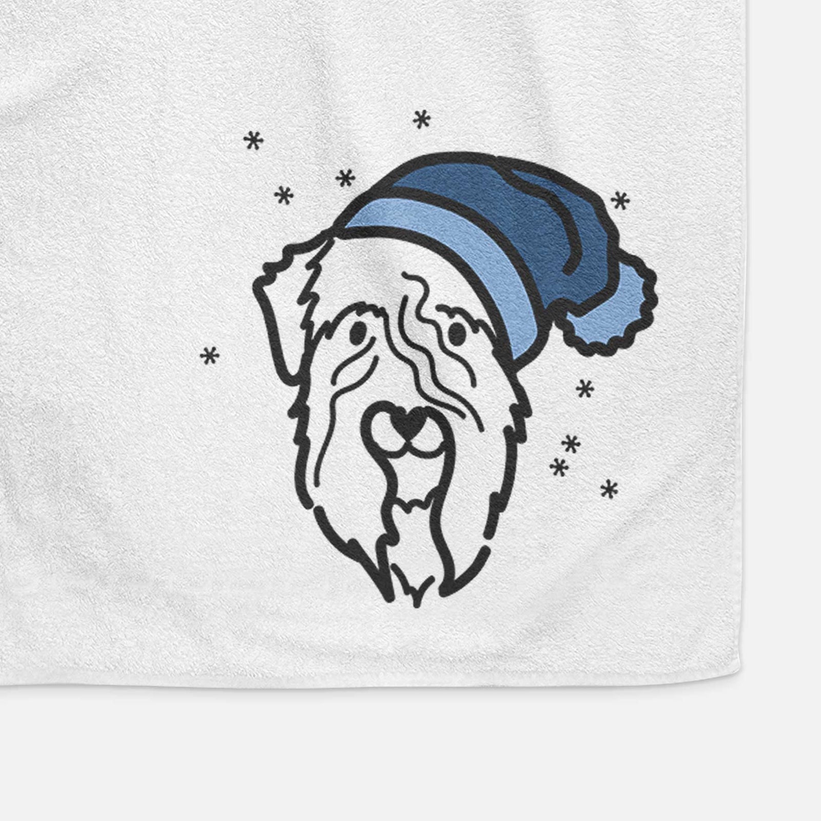 Minimalist line drawing of a Soft Coated Wheaten Terrier wearing a winter beanie on a decorative hand towel