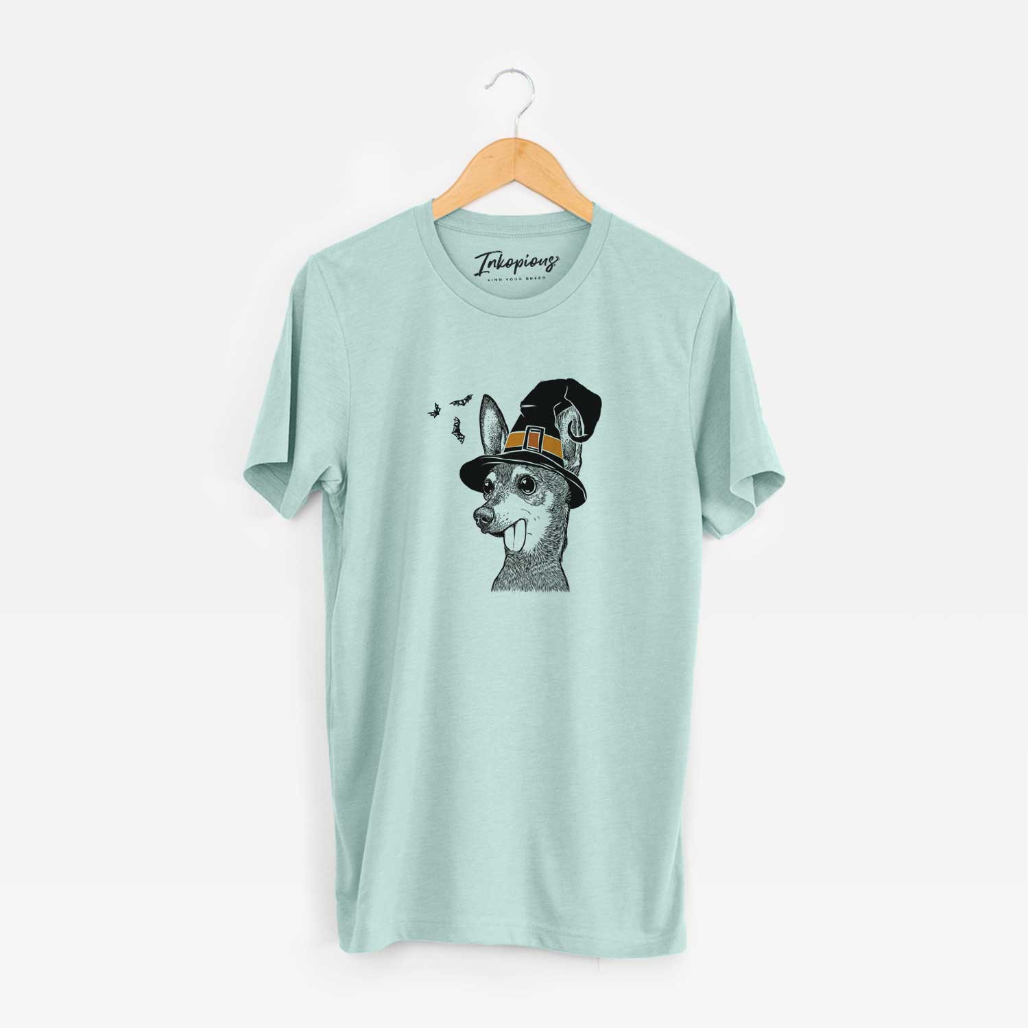 Hand-drawn sketch of Aaron the Chihuahua wearing a witch hat on a Heather Sage Unisex crewneck