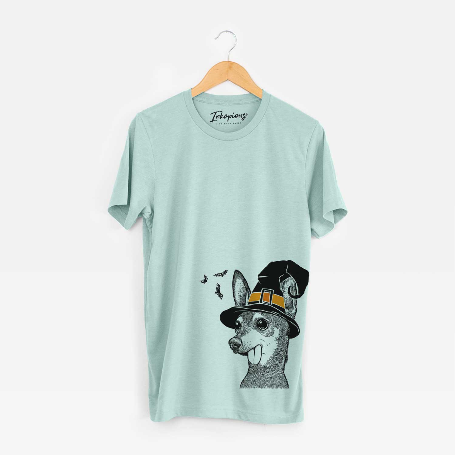 Hand-drawn sketch of Aaron the Chihuahua wearing a witch hat on a Heather Sage Unisex crewneck