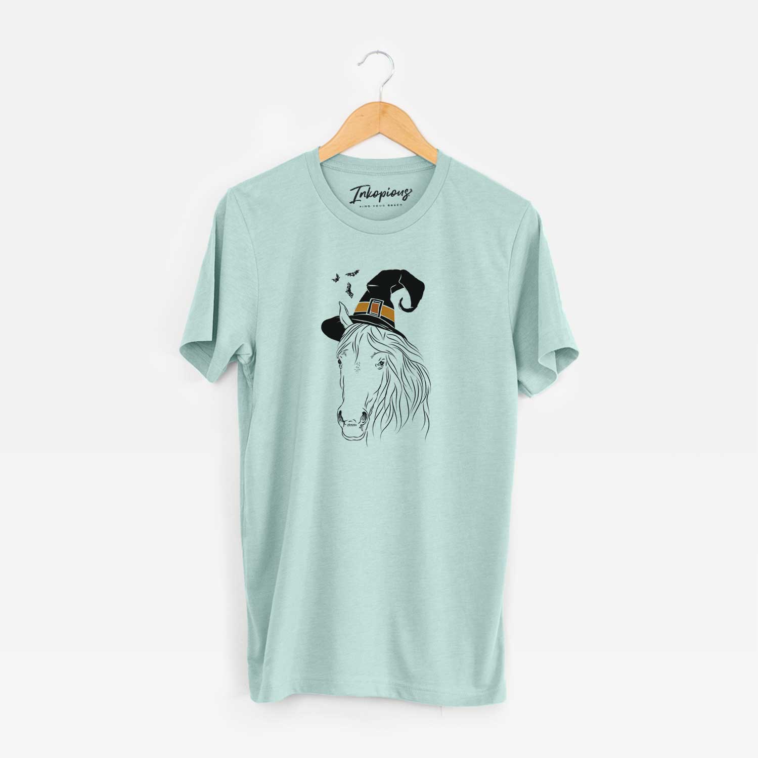 Hand-drawn sketch of Aria the Horse wearing a witch hat on a Heather Sage Unisex crewneck