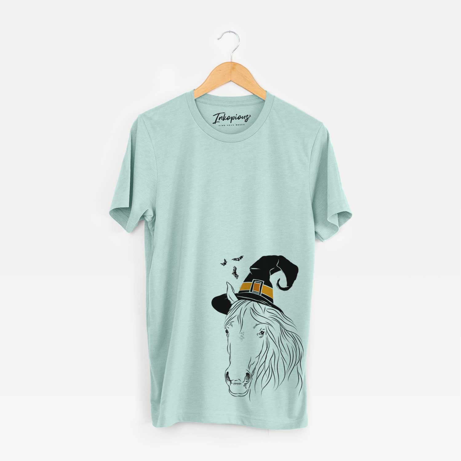 Hand-drawn sketch of Aria the Horse wearing a witch hat on a Heather Sage Unisex crewneck