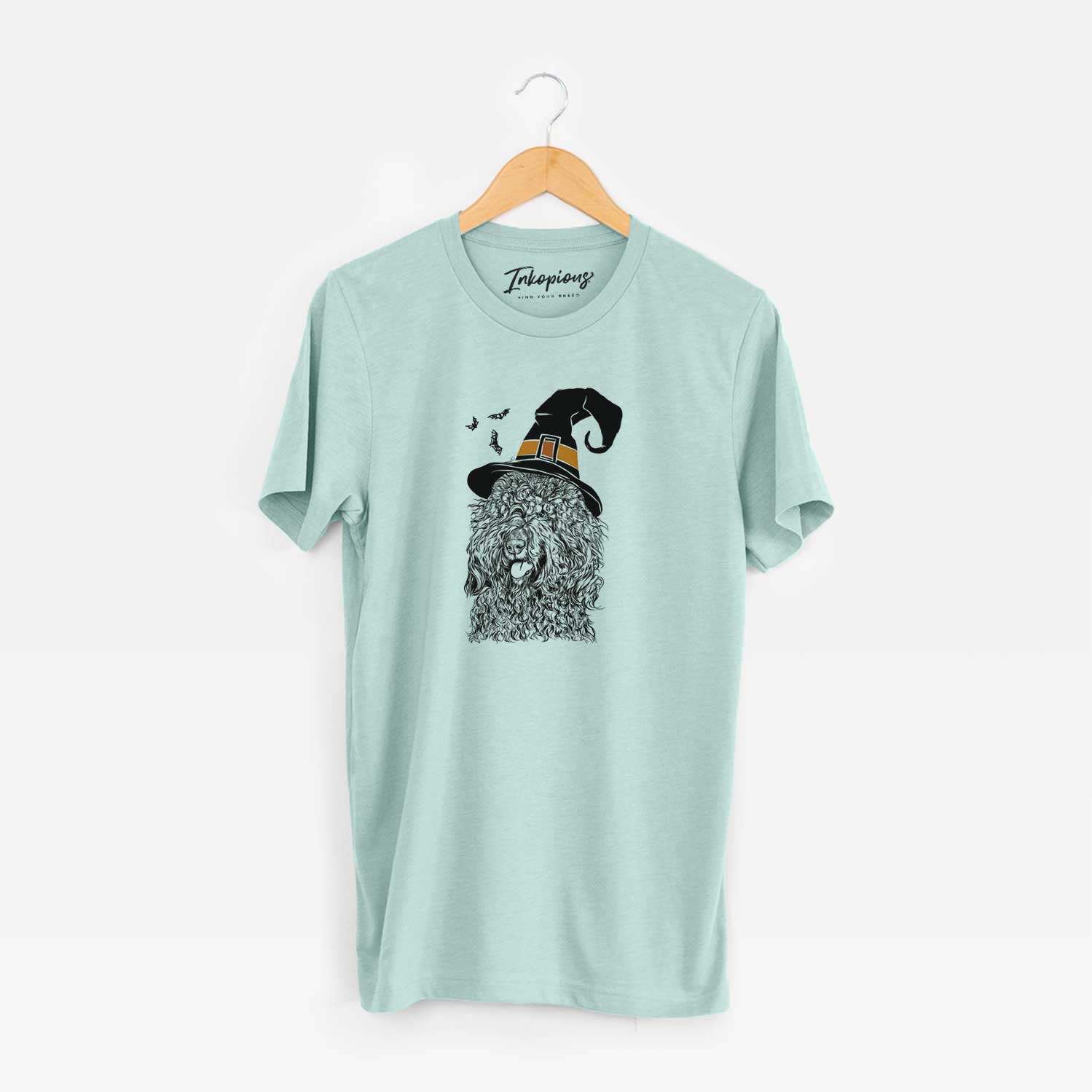 Hand-drawn sketch of Babs the Barbet wearing a witch hat on a Heather Sage Unisex crewneck