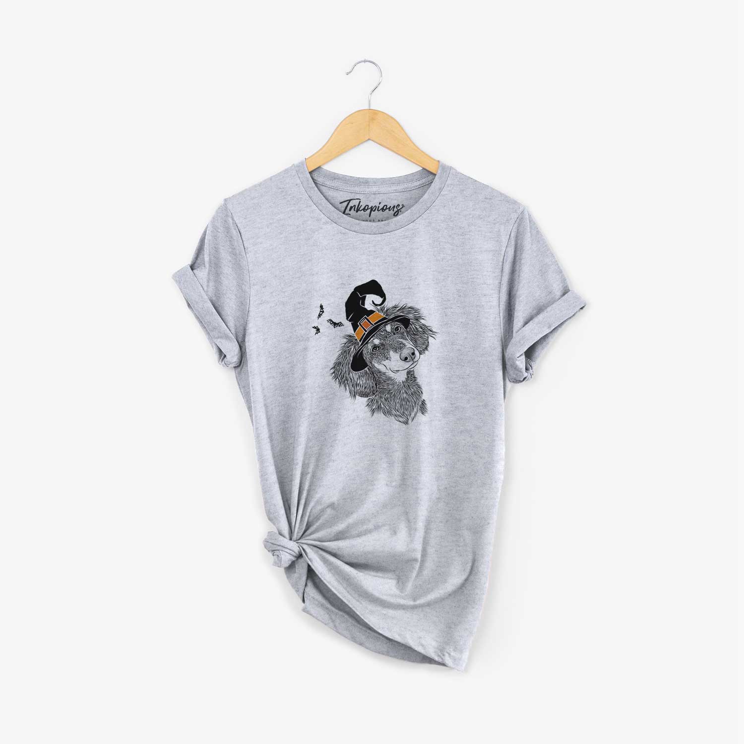 Hand-drawn sketch of Bailey the Long Haired Dachshund wearing a witch hat on a Grey Unisex crewneck