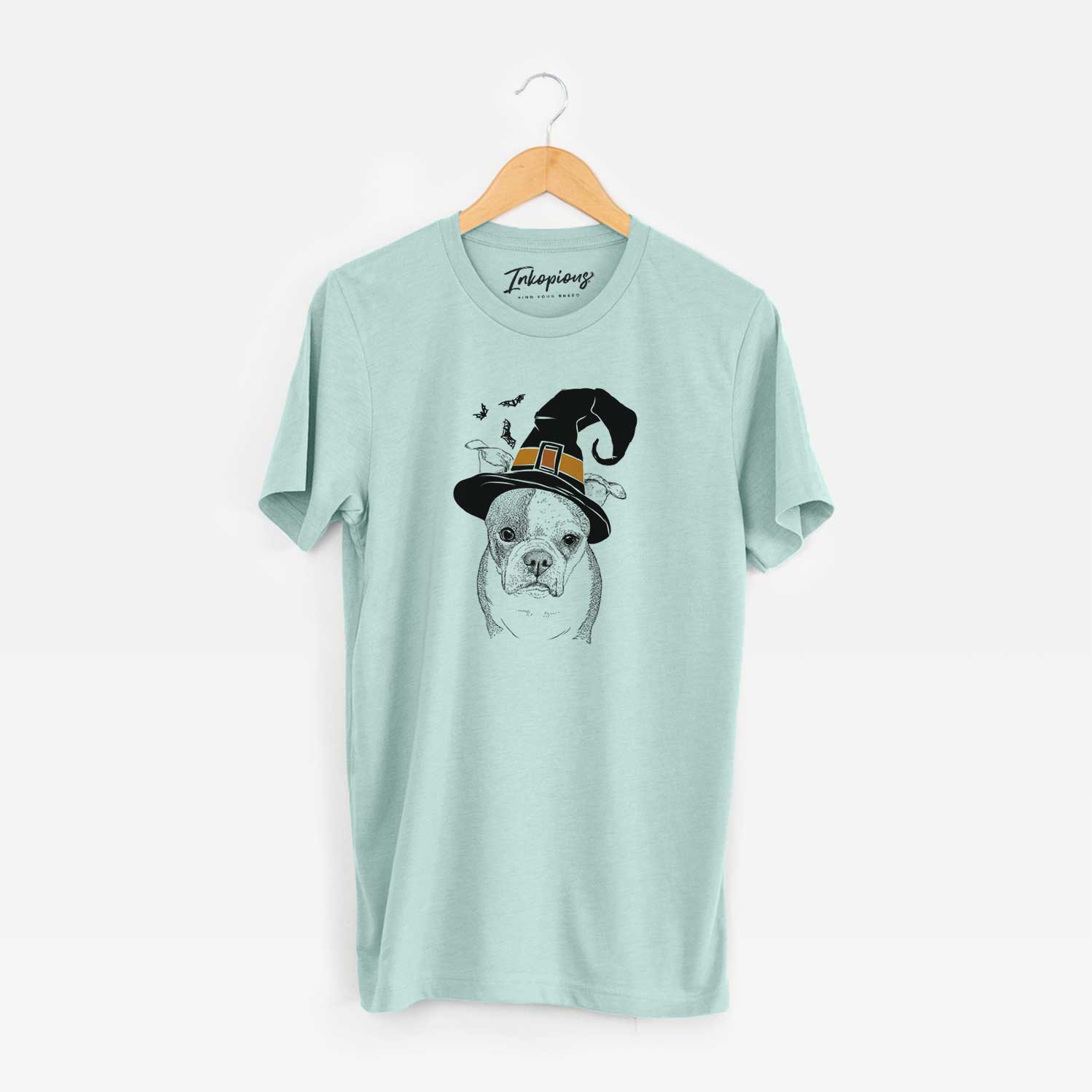 Hand-drawn sketch of Bandit the Boston Terrier wearing a witch hat on a Heather Sage Unisex crewneck